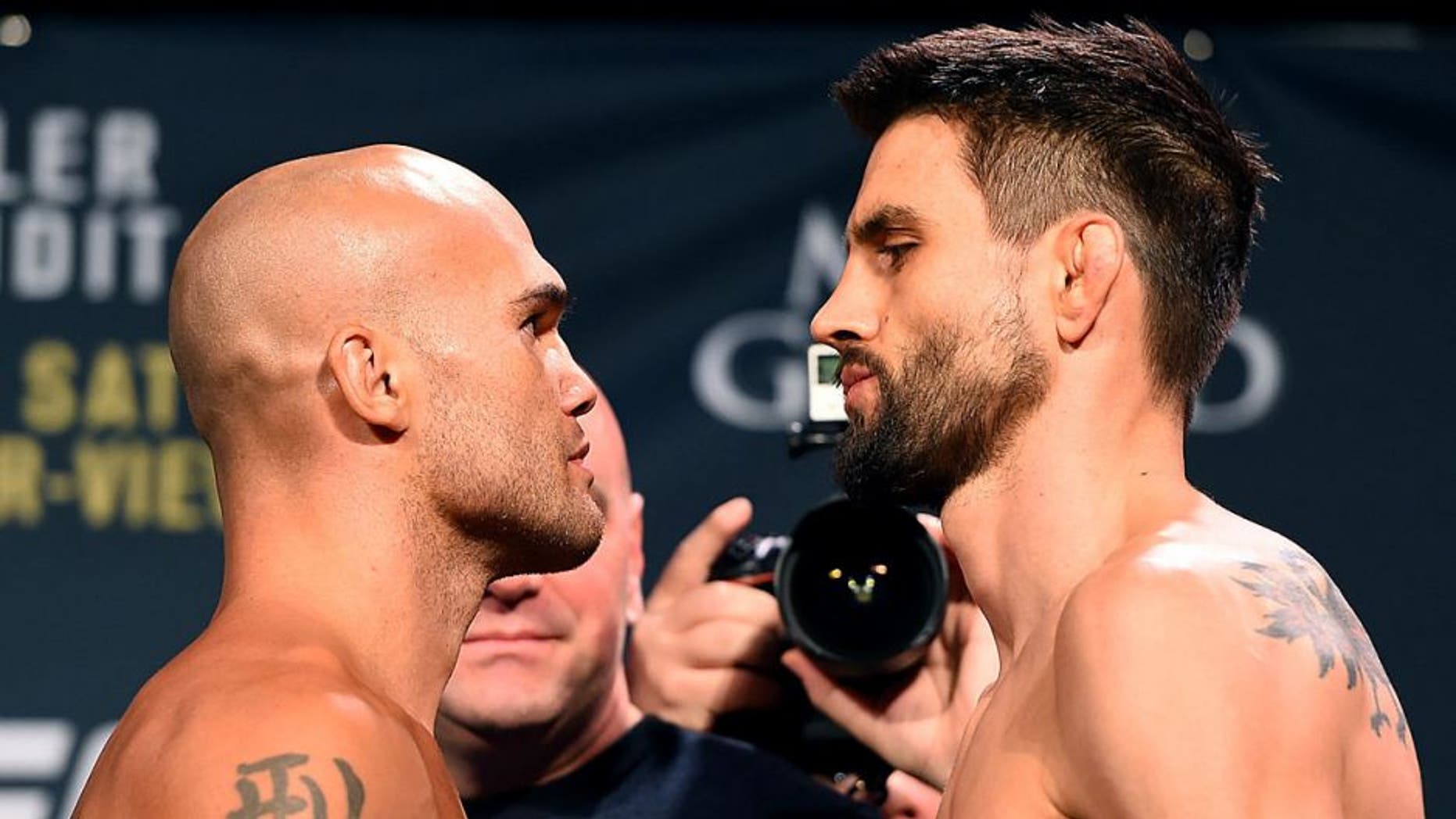 LAS VEGAS, NV - JANUARY 01: (L-R) UFC welterweight champion Robbie Lawler and opponent Carlos Condit face off during the UFC 195 weigh-in at the MGM Grand Conference Center on January 1, 2016 in Las Vegas, Nevada. (Photo by Josh Hedges/Zuffa LLC/Zuffa LLC via Getty Images)