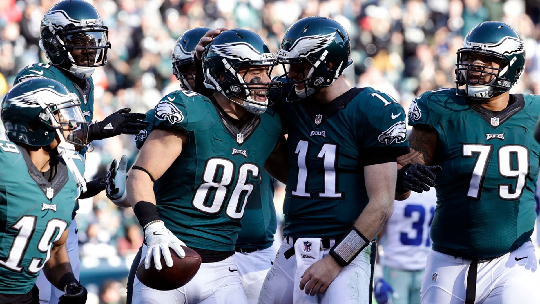 Philadelphia Eagles' Zach Ertz, #86, celebrates his touchdown catch with Carson Wentz during the first half of an NFL football game, Sunday, Jan. 1, 2017, in Philadelphia.