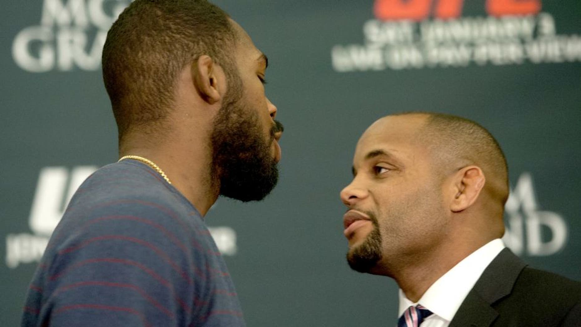 LAS VEGAS, NEVADA - JANUARY 01: (L-R) UFC light heavyweight champion Jon Jones and Daniel Cormier face off during the UFC 182 Media Day at the MGM Grand Hotel and Casino on January 1, 2015 in Las Vegas, Nevada. (Photo by Brandon Magnus/Zuffa LLC/Zuffa LLC via Getty Images)