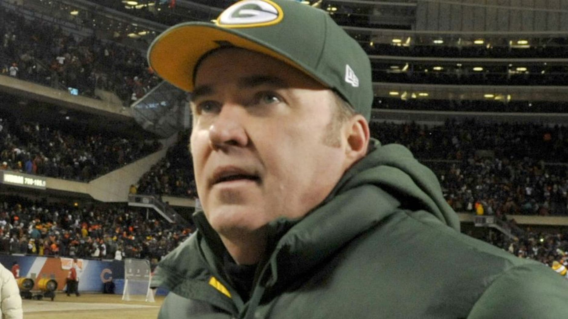 CHICAGO, IL - DECEMBER 29: Head coach Mike McCarthy of the Green Bay Packers leaves the field after their win against the Chicago Bears on December 29, 2013 at Soldier Field in Chicago, Illinois. The Green Bay Packers defeated the Chicago Bears 33-28. (Photo by David Banks/Getty Images)