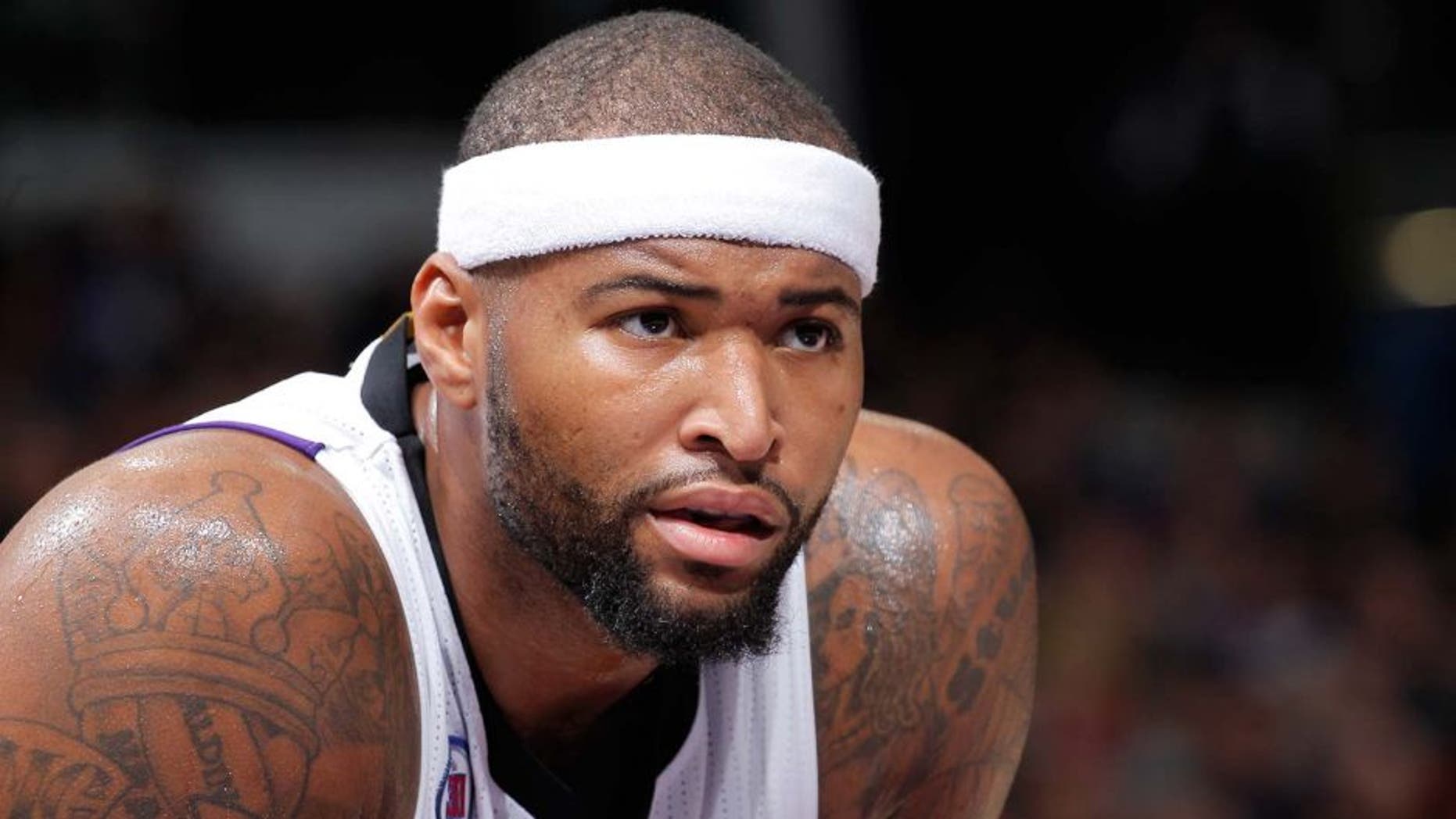 SACRAMENTO, CA - DECEMBER 18: DeMarcus Cousins #15 of the Sacramento Kings looks on during the game against the Milwaukee Bucks on December 18, 2014 at Sleep Train Arena in Sacramento, California. NOTE TO USER: User expressly acknowledges and agrees that, by downloading and or using this photograph, User is consenting to the terms and conditions of the Getty Images Agreement. Mandatory Copyright Notice: Copyright 2014 NBAE (Photo by Rocky Widner/NBAE via Getty Images)