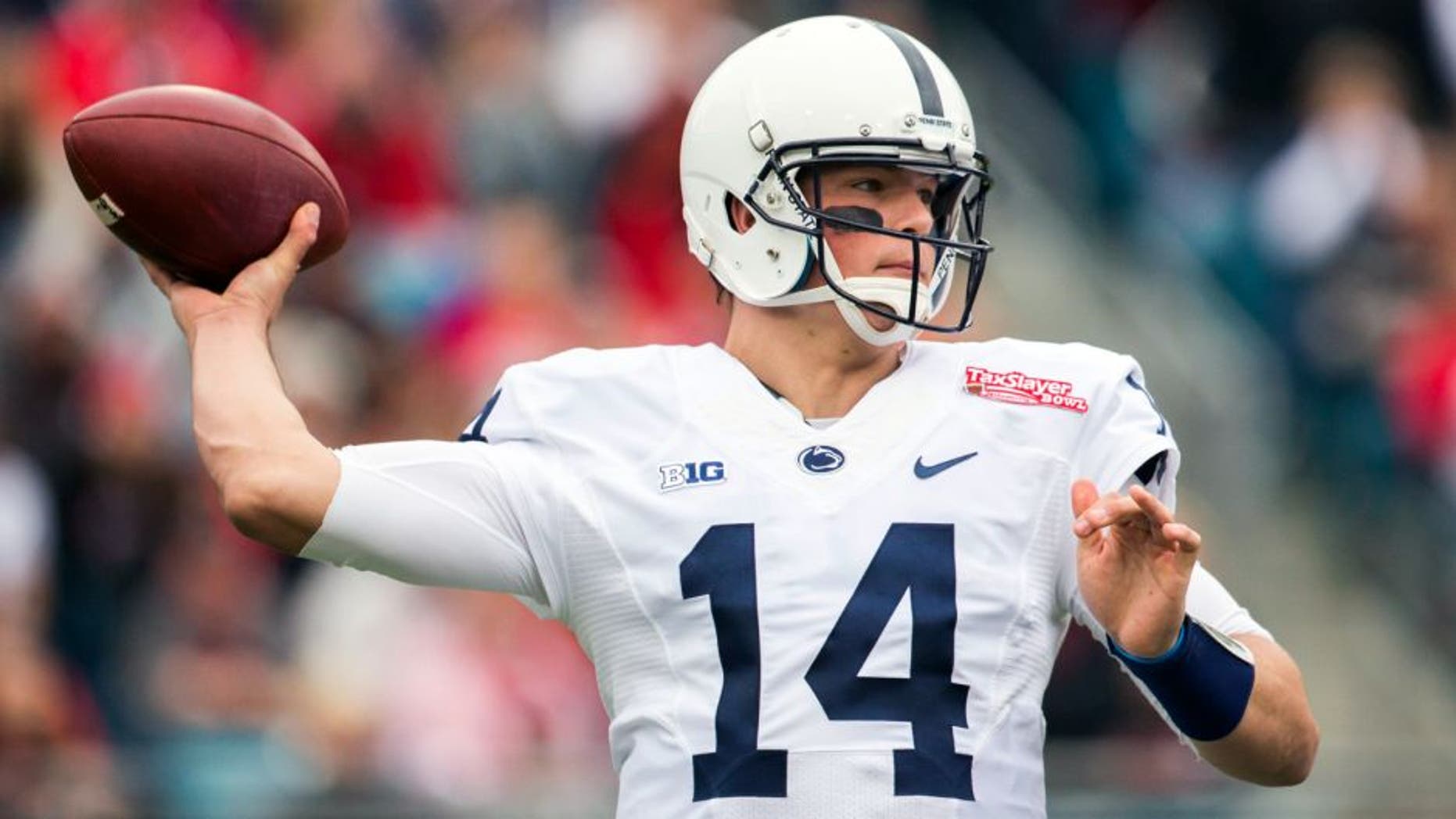 Jan 2, 2016; Jacksonville, FL, USA; Penn State Nittany Lions quarterback Christian Hackenberg (14) throws a pass during the first quarter against the Georgia Bulldogs at EverBank Field. Mandatory Credit: Logan Bowles-USA TODAY Sports