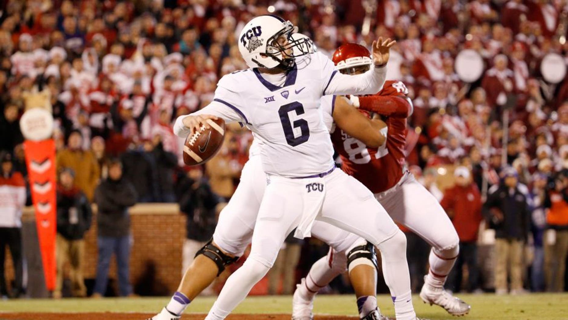 Nov 21, 2015; Norman, OK, USA; TCU Horned Frogs quarterback Bram Kohlhausen (6) throws during the game against the Oklahoma Sooners at Gaylord Family - Oklahoma Memorial Stadium. Mandatory Credit: Kevin Jairaj-USA TODAY Sports