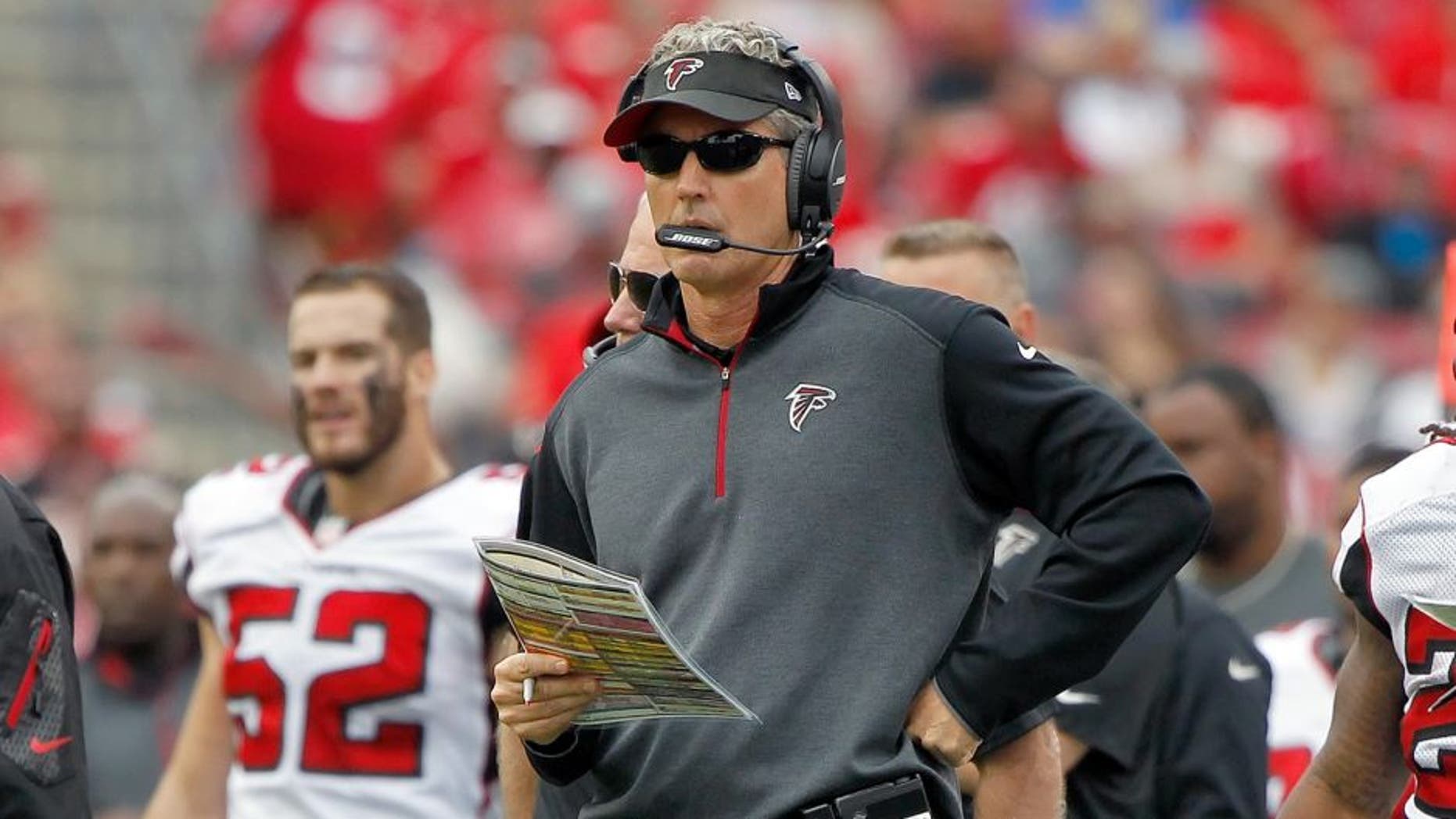 Nov 9, 2014; Tampa, FL, USA; Atlanta Falcons offensive coordinator Dirk Koetter against the Tampa Bay Buccaneers during the second half at Raymond James Stadium. Atlanta Falcons defeated the Tampa Bay Buccaneers 27-17. Mandatory Credit: Kim Klement-USA TODAY Sports