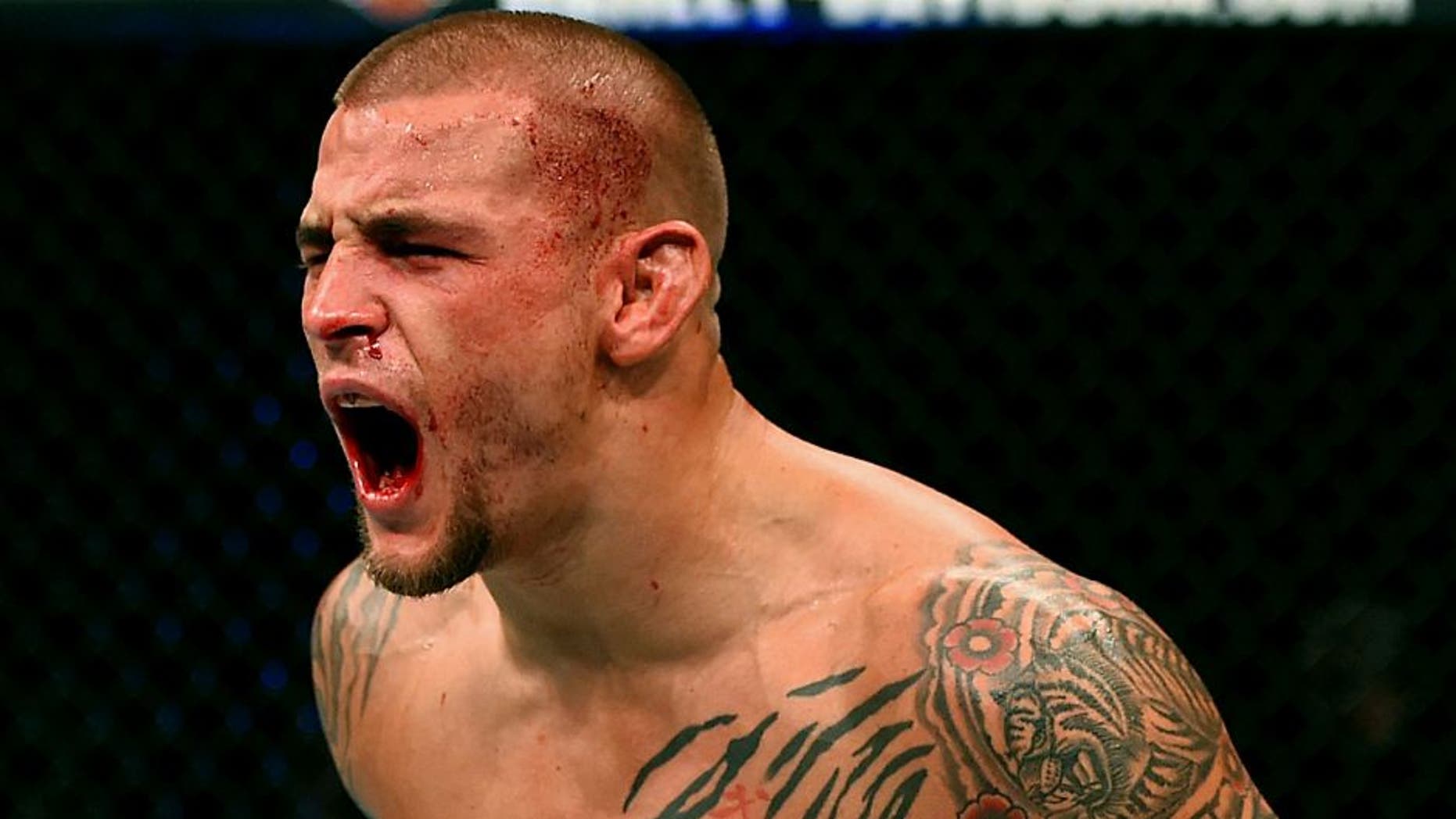 LAS VEGAS, NV - JANUARY 02: Dustin Poirier reacts to his victory over Joe Duffy of Ireland in their lightweight bout during the UFC 195 event inside MGM Grand Garden Arena on January 2, 2016 in Las Vegas, Nevada. (Photo by Josh Hedges/Zuffa LLC/Zuffa LLC via Getty Images)