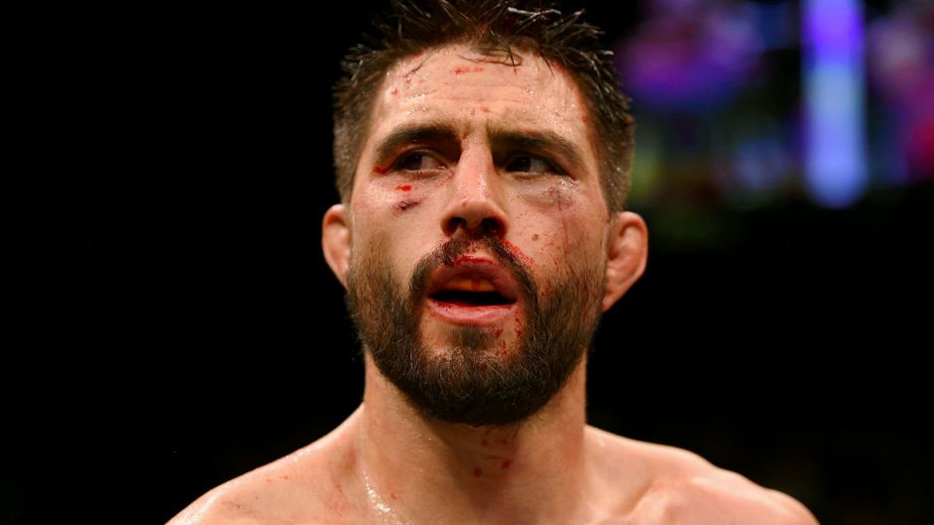 LAS VEGAS, NV - JANUARY 02: Carlos Condit awaits the official decision in his UFC welterweight championship bout during the UFC 195 event inside MGM Grand Garden Arena on January 2, 2016 in Las Vegas, Nevada. (Photo by Josh Hedges/Zuffa LLC/Zuffa LLC via Getty Images)
