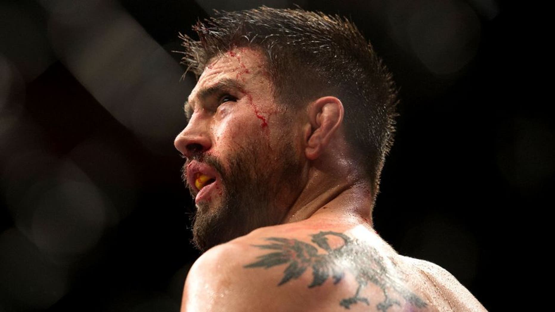 LAS VEGAS, NV - JANUARY 02: Carlos Condit reacts to his loss to Robbie Lawler in their welterweight championship fight during the UFC 195 event inside MGM Grand Garden Arena on January 2, 2016 in Las Vegas, Nevada. (Photo by Brandon Magnus/Zuffa LLC/Zuffa LLC via Getty Images)