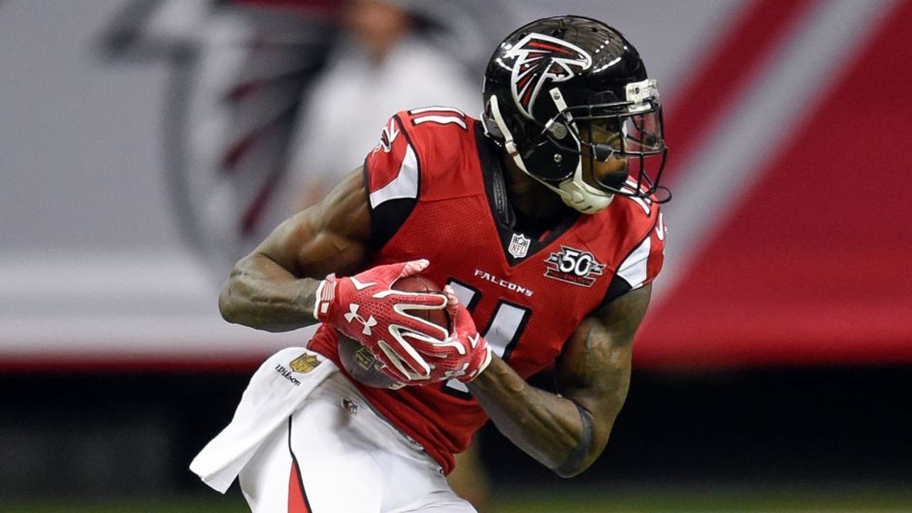 Jan 3, 2016; Atlanta, GA, USA; Atlanta Falcons wide receiver Julio Jones (11) makes a catch against the New Orleans Saints during the first half at the Georgia Dome. The Saints defeated the Falcons 20-17. Mandatory Credit: Dale Zanine-USA TODAY Sports