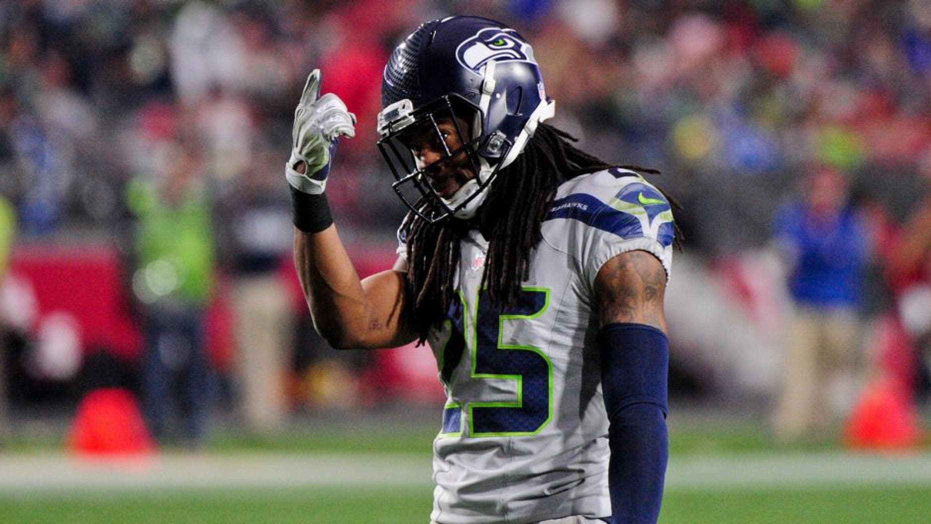 Jan 3, 2016; Glendale, AZ, USA; Seattle Seahawks cornerback Richard Sherman (25) reacts during the second half against the Arizona Cardinals at University of Phoenix Stadium. Mandatory Credit: Matt Kartozian-USA TODAY Sports
