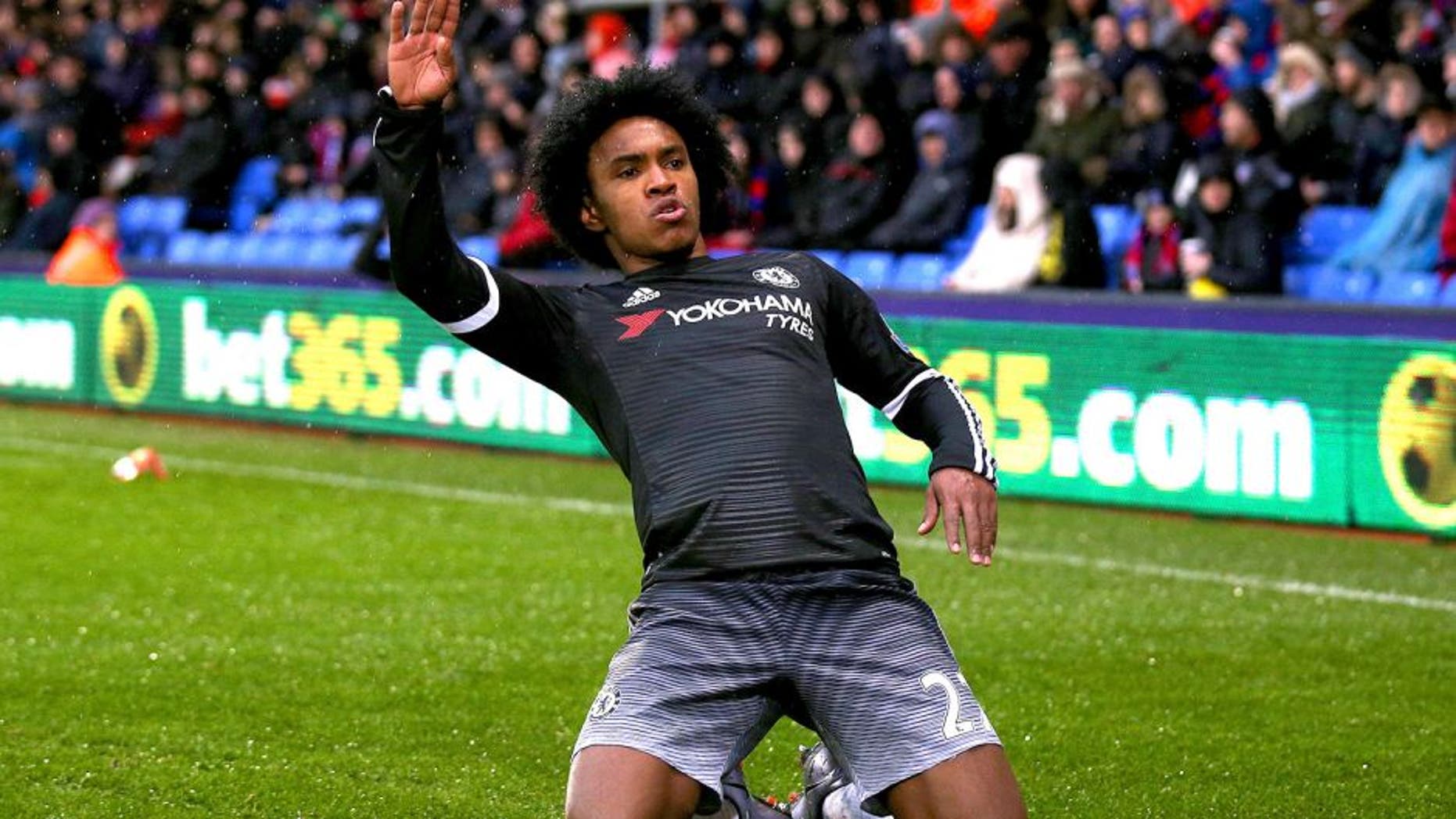 LONDON, ENGLAND - JANUARY 03: Willian of Chelsea celebrates after scoring his team's second goal during the Barclays Premier League match between Crystal Palace and Chelsea at Selhurst Park on January 3, 2016 in London, England. (Photo by Ian Walton/Getty Images)
