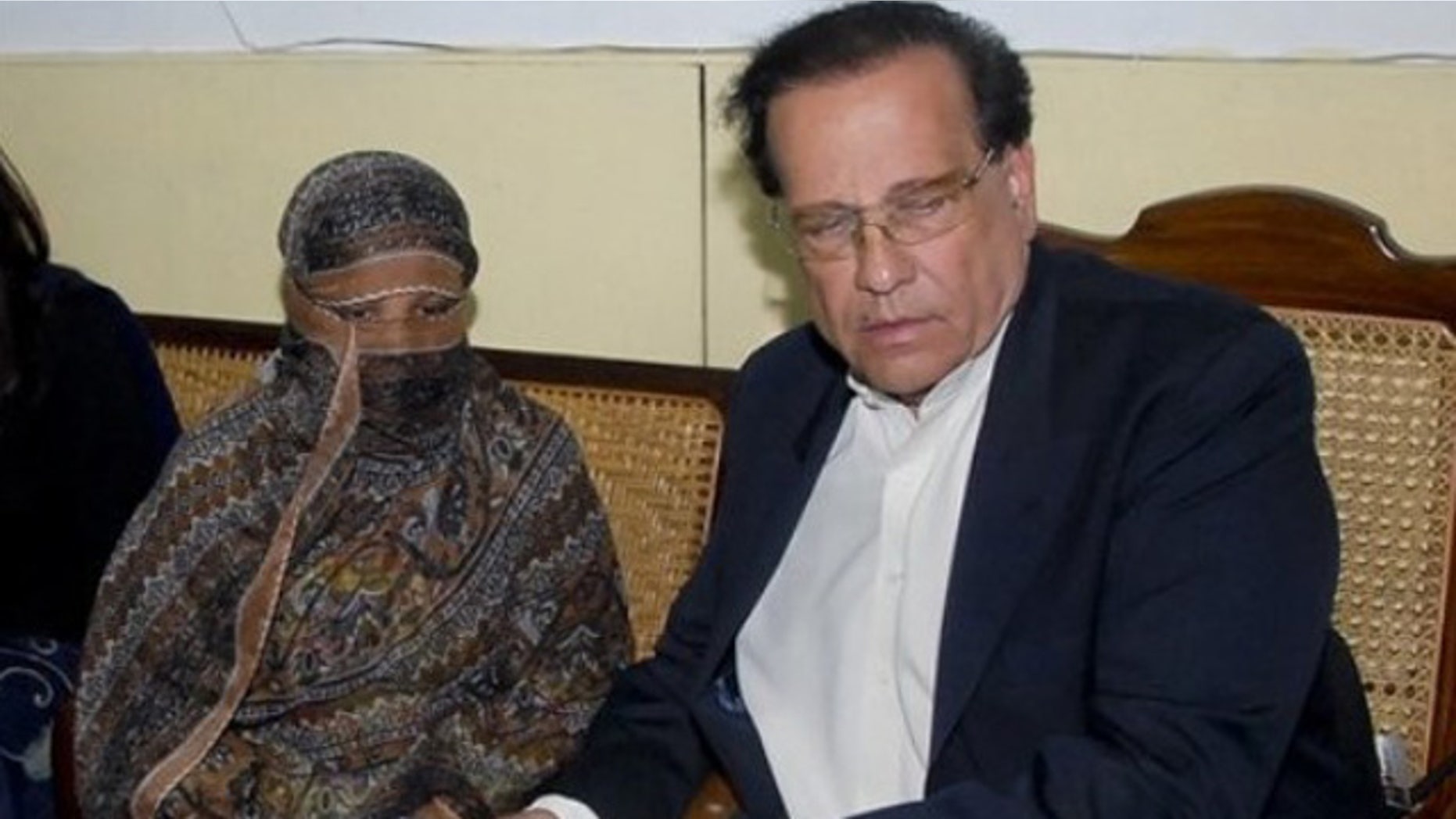 Nov. 20: Salman Taseer, right, Governor of Pakistani Punjab Province, listens to Pakistani Christian woman Asia Bibi, left, at a prison in Sheikhupura near Lahore, Pakistan.