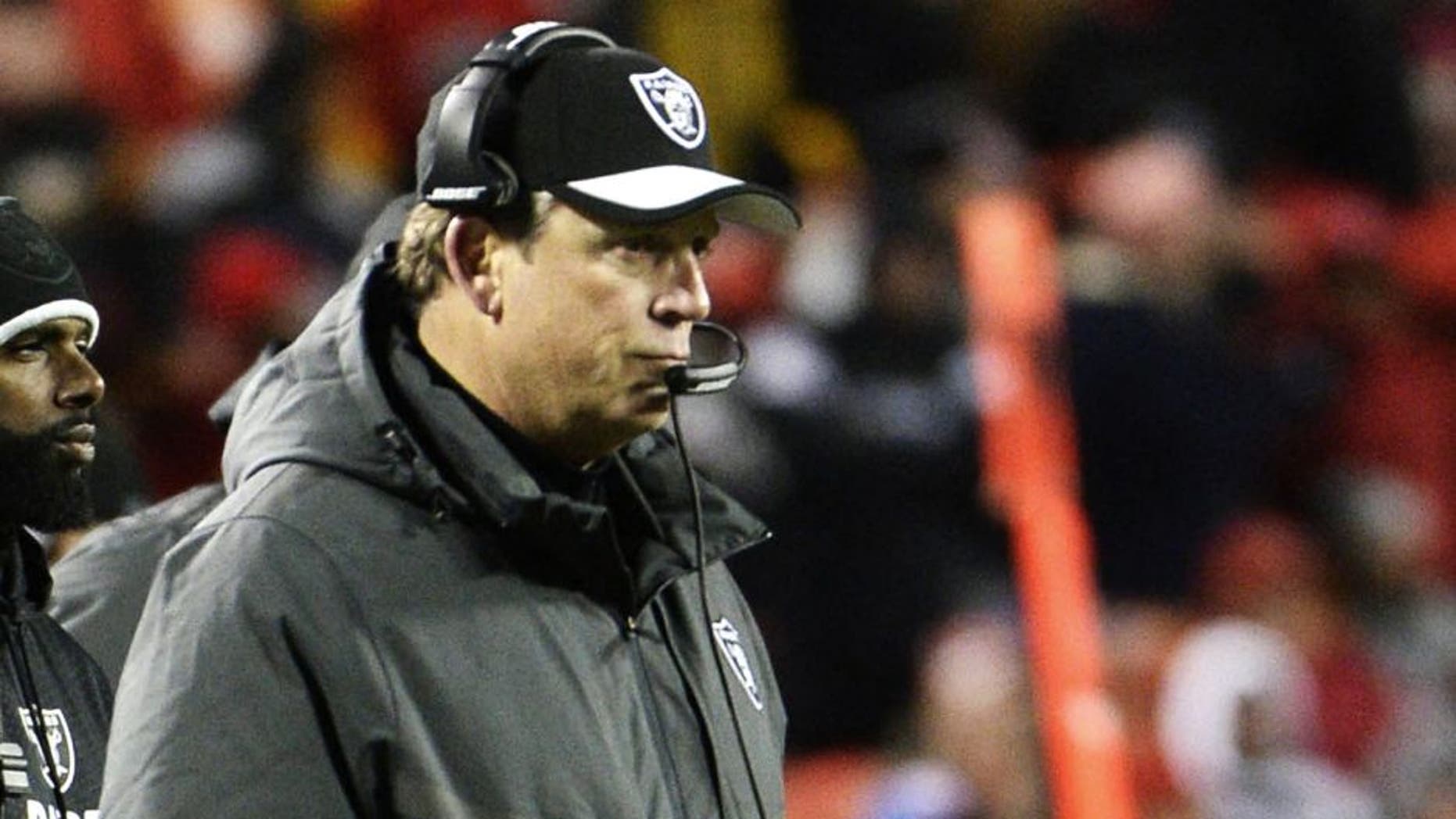 Jan 3, 2016; Kansas City, MO, USA; Oakland Raiders head coach Jack Del Rio watches against the Kansas City Chiefs in the second half at Arrowhead Stadium. Kansas City won the game 23-17. Mandatory Credit: John Rieger-USA TODAY Sports