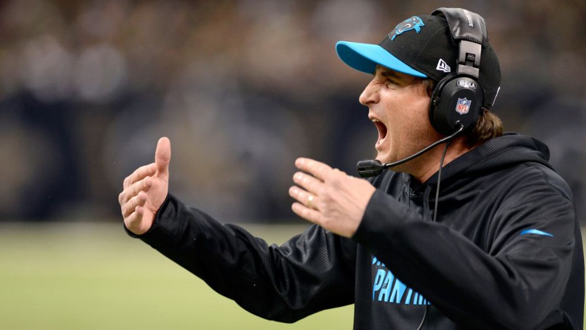 Dec 30, 2012; New Orleans, LA, USA; Carolina Panthers quarterback coach Mike Shula yells to the team from the sidelines during second half of their game against the New Orleans Saints at the Mercedes-Benz Superdome. The Carolina Panthers defeated the New Orleans Saints 44-38. John David Mercer-USA TODAY Sports