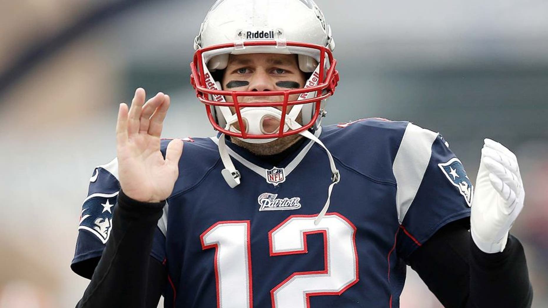 Dec 8, 2013; Foxborough, MA, USA; New England Patriots quarterback Tom Brady (12) takes the field before the game against the Cleveland Browns at Gillette Stadium. Mandatory Credit: Winslow Townson-USA TODAY Sports