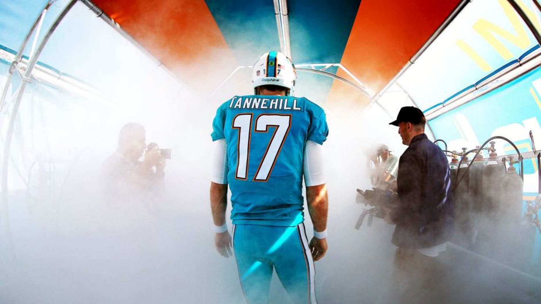 MIAMI GARDENS, FL - JANUARy 03: Ryan Tannehill #17 of the Miami Dolphins prepares to take the field before the game against the New England Patriots at Sun Life Stadium on January 3, 2016 in Miami Gardens, Florida. (Photo by Mike Ehrmann/Getty Images)
