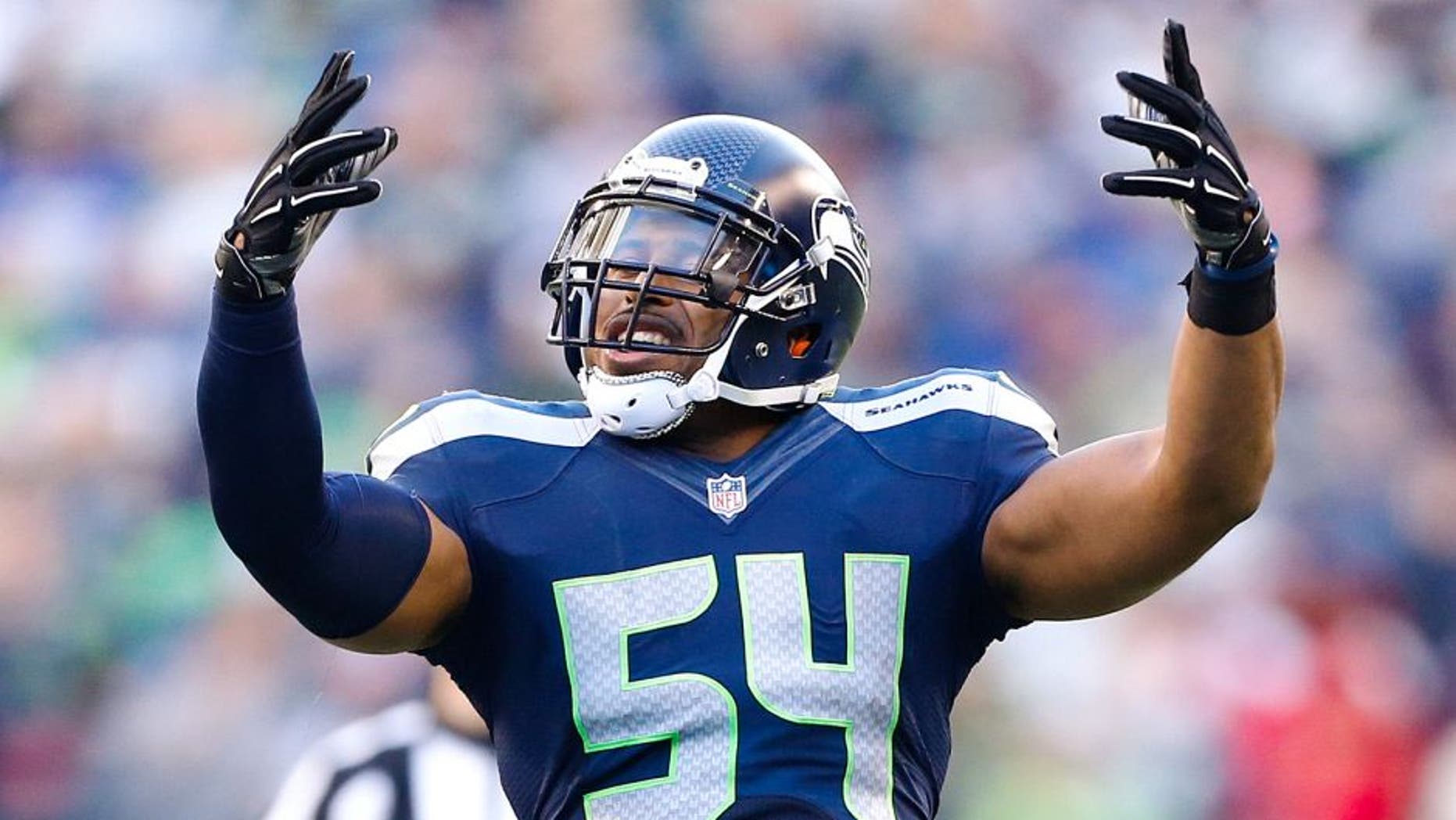 Nov 23, 2014; Seattle, WA, USA; Seattle Seahawks middle linebacker Bobby Wagner (54) dances during a timeout against the Arizona Cardinals during the third quarter at CenturyLink Field. Mandatory Credit: Joe Nicholson-USA TODAY Sports