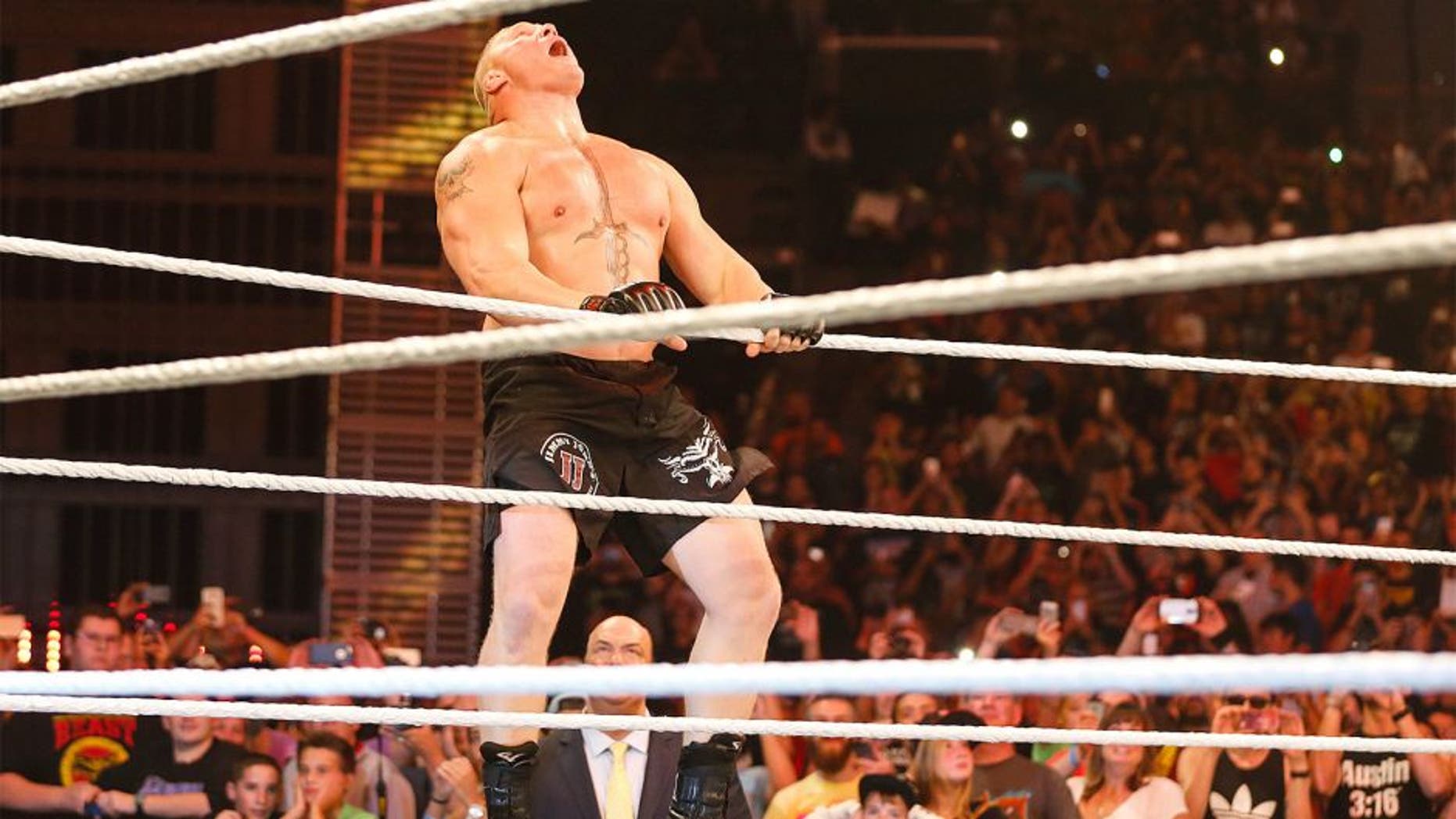 NEW YORK, NY - AUGUST 23: Brock Lesnar enters the ring at the WWE SummerSlam 2015 at Barclays Center of Brooklyn on August 23, 2015 in New York City. (Photo by JP Yim/Getty Images)