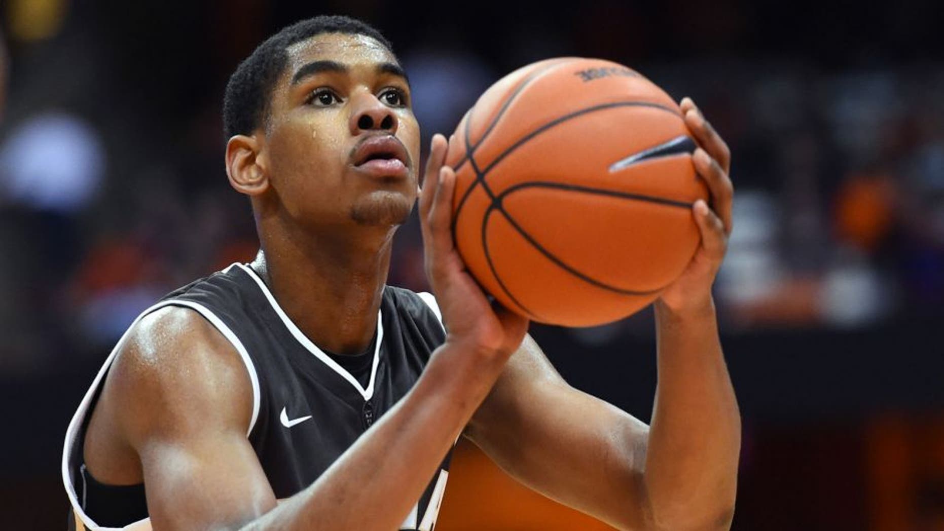Nov 17, 2015; Syracuse, NY, USA; St. Bonaventure Bonnies forward Denzel Gregg (12) shoot a free throw against the Syracuse Orange during the second half at the Carrier Dome. Syracuse defeated St. Bonaventure 79-66. Mandatory Credit: Rich Barnes-USA TODAY Sports