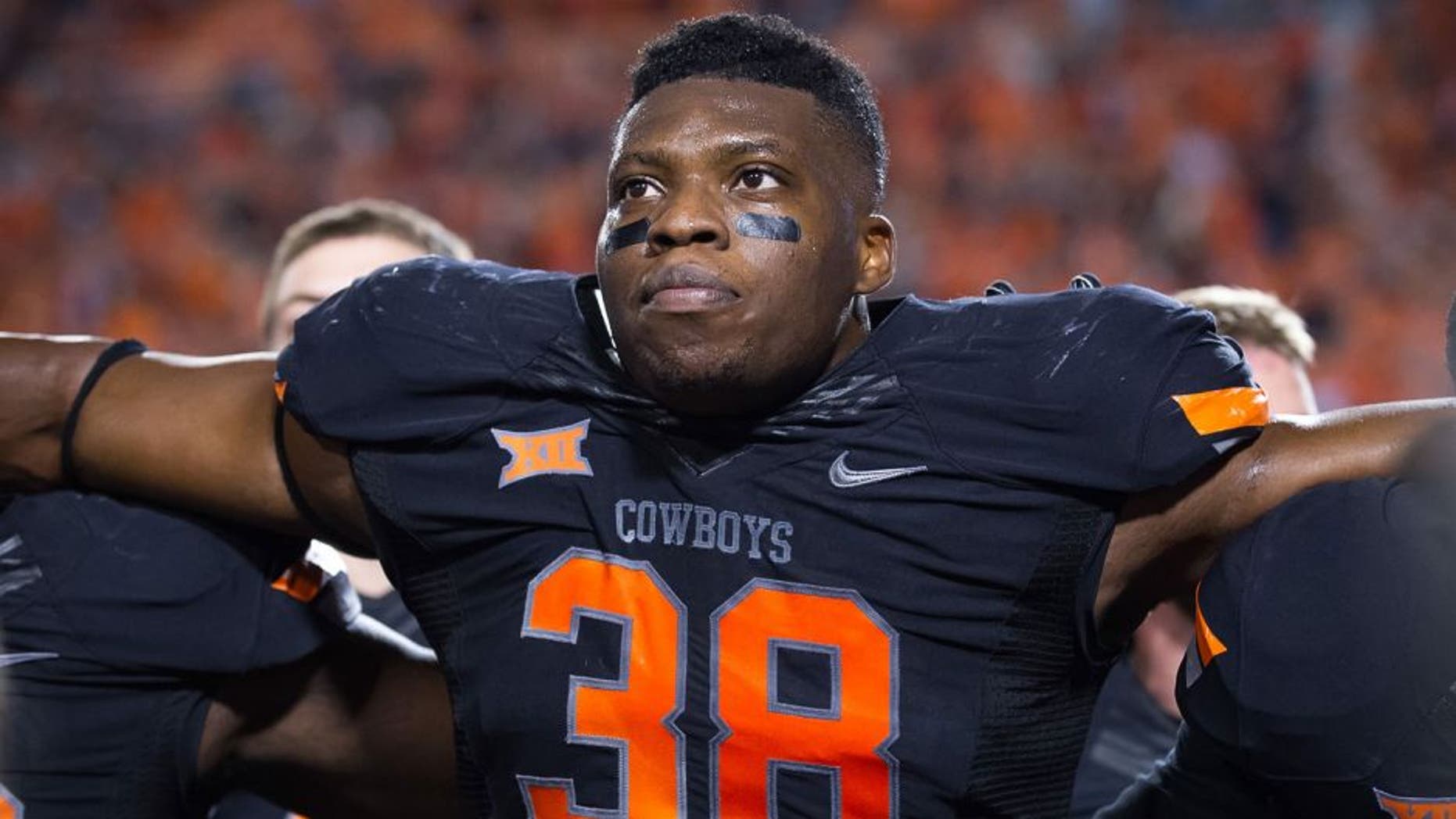 Nov 7, 2015; Stillwater, OK, USA; Oklahoma State Cowboys defensive end Emmanuel Ogbah (38) after the game against the TCU Horned Frogs at Boone Pickens Stadium. OSU won 49-29. Mandatory Credit: Rob Ferguson-USA TODAY Sports