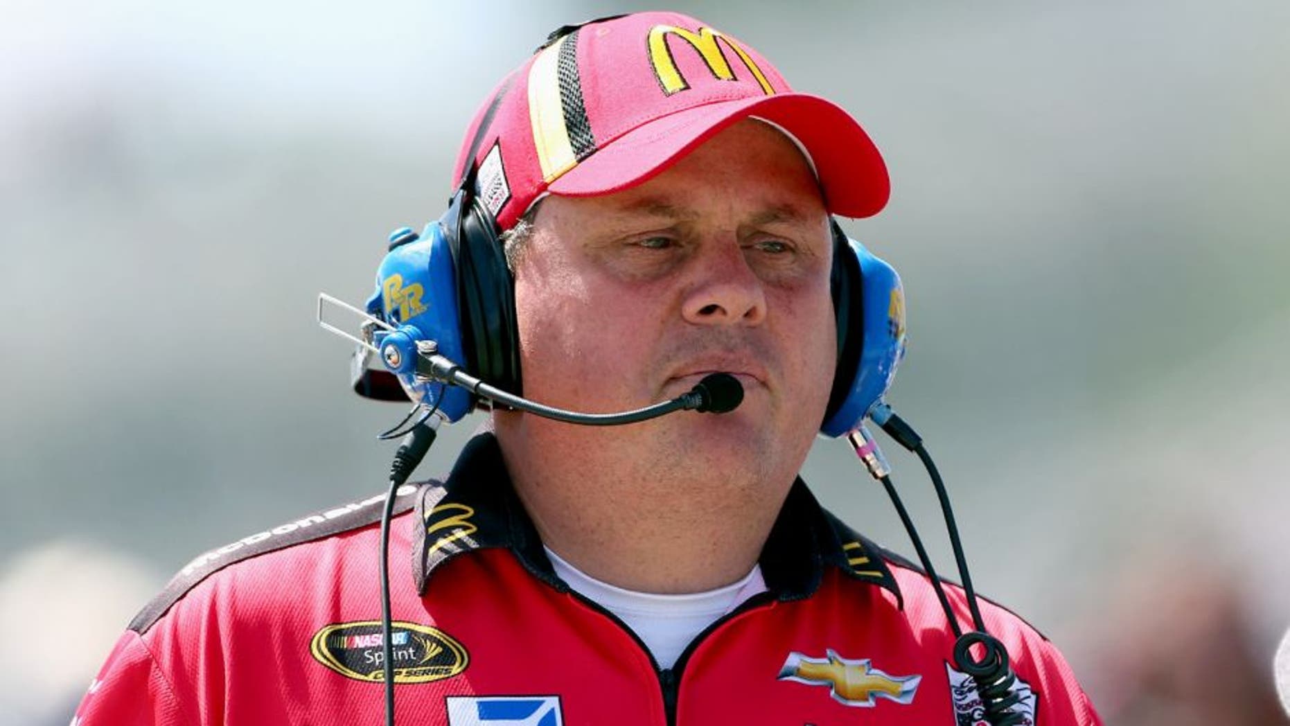 WATKINS GLEN, NY - AUGUST 10: Kevin Manion, crew chief of the #1 McDonald's/Monopoly Chevrolet, during qualifying for the NASCAR Sprint Cup Series Cheez-It 355 at The Glen at Watkins Glen International on August 10, 2013 in Watkins Glen, New York. (Photo by Todd Warshaw/Getty Images)