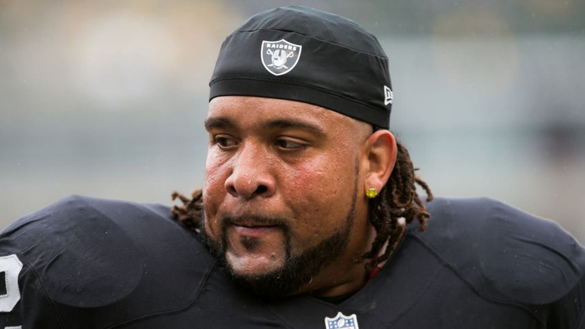 Dec 6, 2015; Oakland, CA, USA; Oakland Raiders tackle Donald Penn (72) warms up before the game against the Kansas City Chiefs at O.co Coliseum. Mandatory Credit: Kelley L Cox-USA TODAY Sports