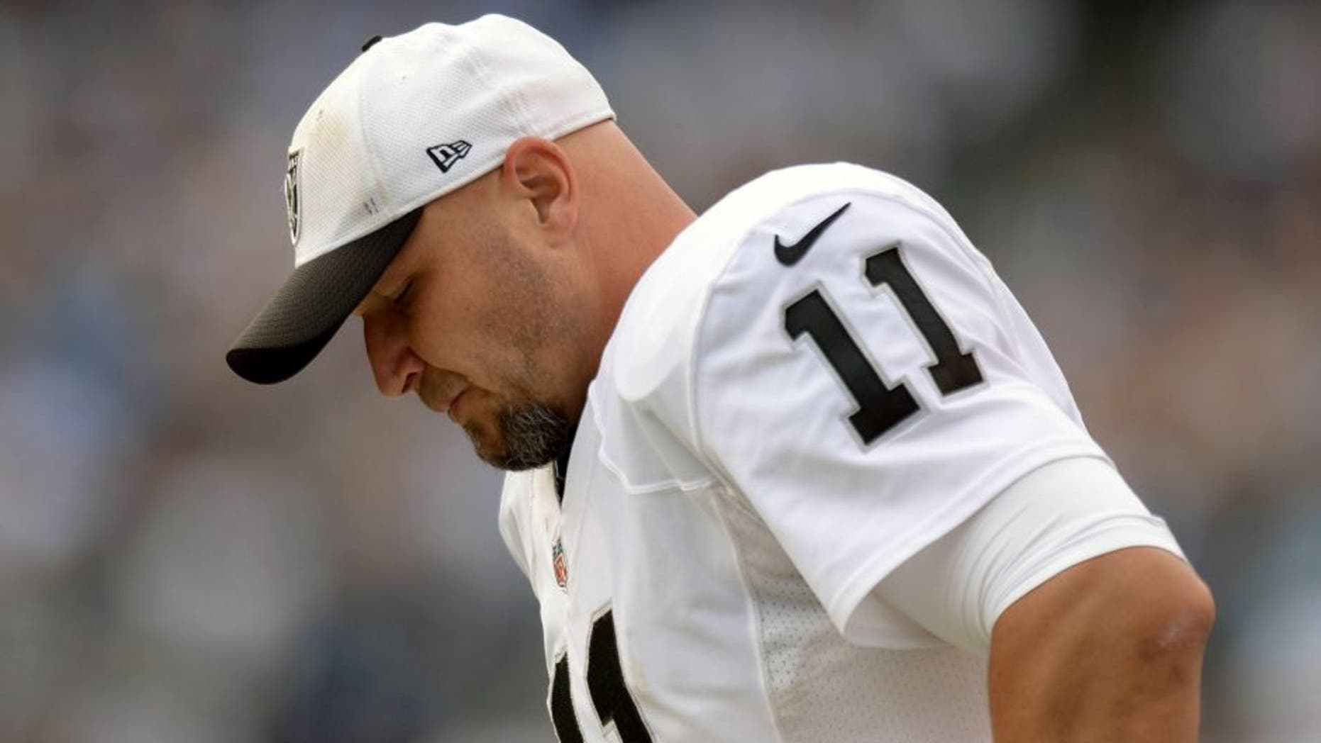 Oct 25, 2015; San Diego, CA, USA; Oakland Raiders kicker Sebastian Janikowski (11) looks on during the fourth quarter against the San Diego Chargers at Qualcomm Stadium. Mandatory Credit: Jake Roth-USA TODAY Sports
