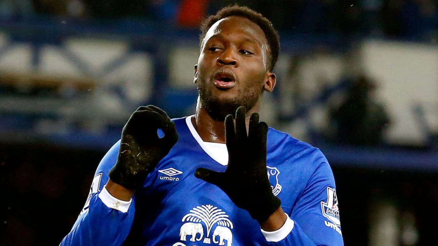 Everton's Belgian striker Romelu Lukaku celebrates scoing his team's first goal during the English Premier League football match between Everton and Crystal Palace at Goodison Park in Liverpool on December 7, 2015. AFP PHOTO / LINDESY PARNABY RESTRICTED TO EDITORIAL USE. No use with unauthorized audio, video, data, fixture lists, club/league logos or 'live' services. Online in-match use limited to 75 images, no video emulation. No use in betting, games or single club/league/player publications. / AFP / LINDSEY PARNABY (Photo credit should read LINDSEY PARNABY/AFP/Getty Images)