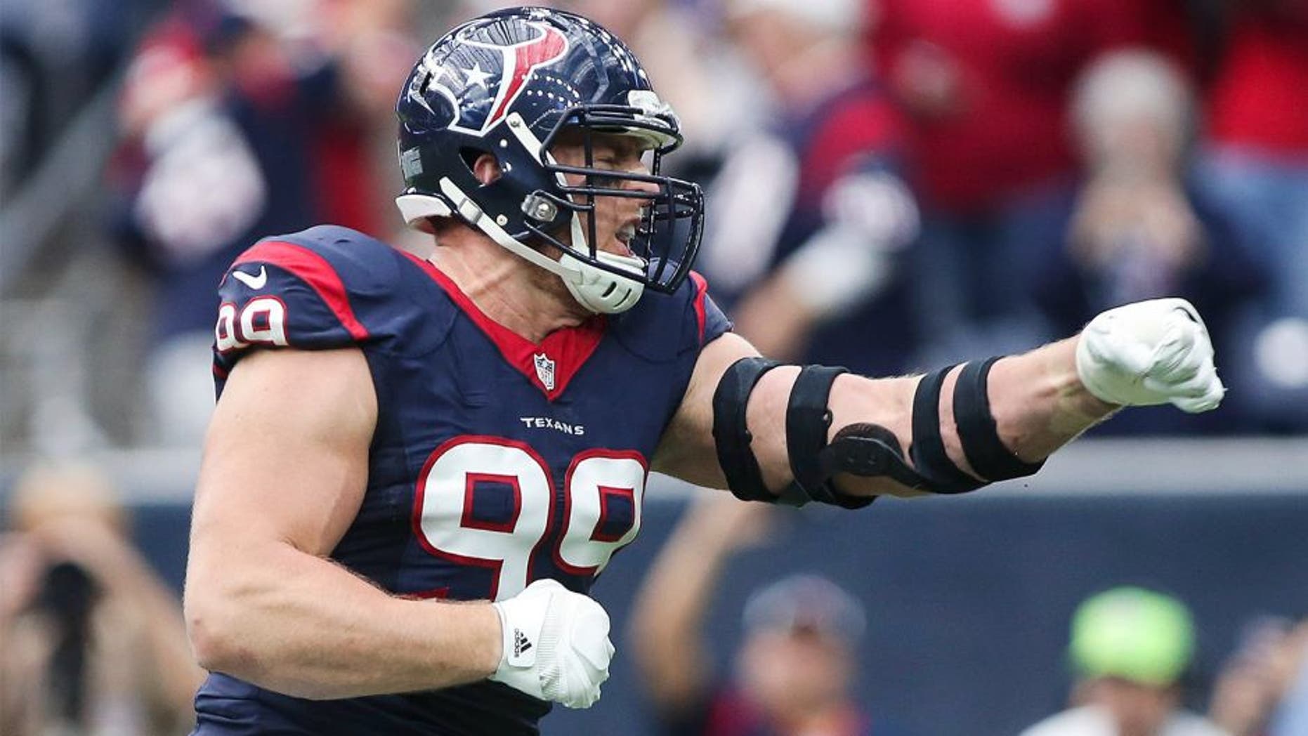 Jan 3, 2016; Houston, TX, USA; Houston Texans defensive end J.J. Watt (99) celebrates after a sack during the first quarter against the Jacksonville Jaguars at NRG Stadium. Mandatory Credit: Troy Taormina-USA TODAY Sports