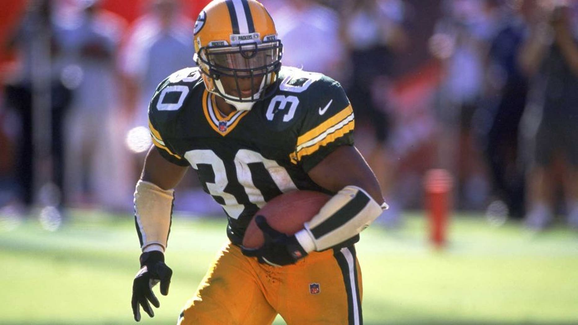 24 Sep 2000: Ahman Green #30 of the Green Bay Packers runs with the ball during the game against the Arizona Cardinals at the Sun Devil Stadium in Tempe, Arizona. The Packers defeated the Cardinals 29-3.Mandatory Credit: Harry How /Allsport