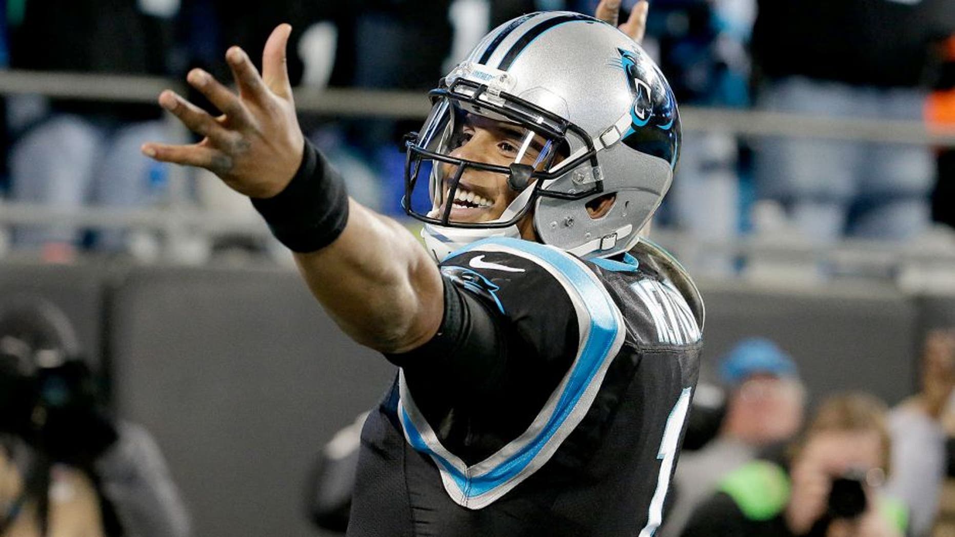 Jan 3, 2016; Charlotte, NC, USA; Carolina Panthers quarterback Cam Newton (1) stands in the endzone after a touchdown pass in the fourth quarter against the Tampa Bay Buccaneers at Bank of America Stadium. Mandatory Credit: Jeremy Brevard-USA TODAY Sports