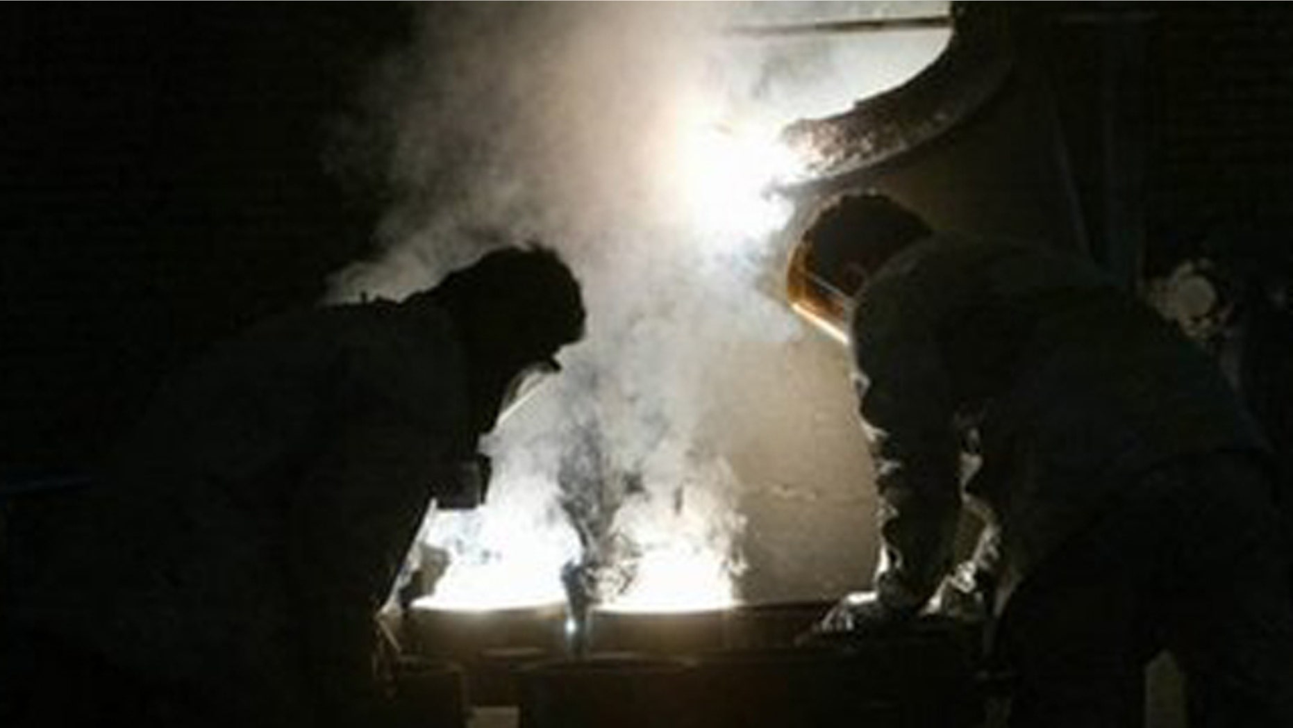 Jan. 8: Two Iranian technicians at the zirconium production plant inside the Isfahan nuclear facility.