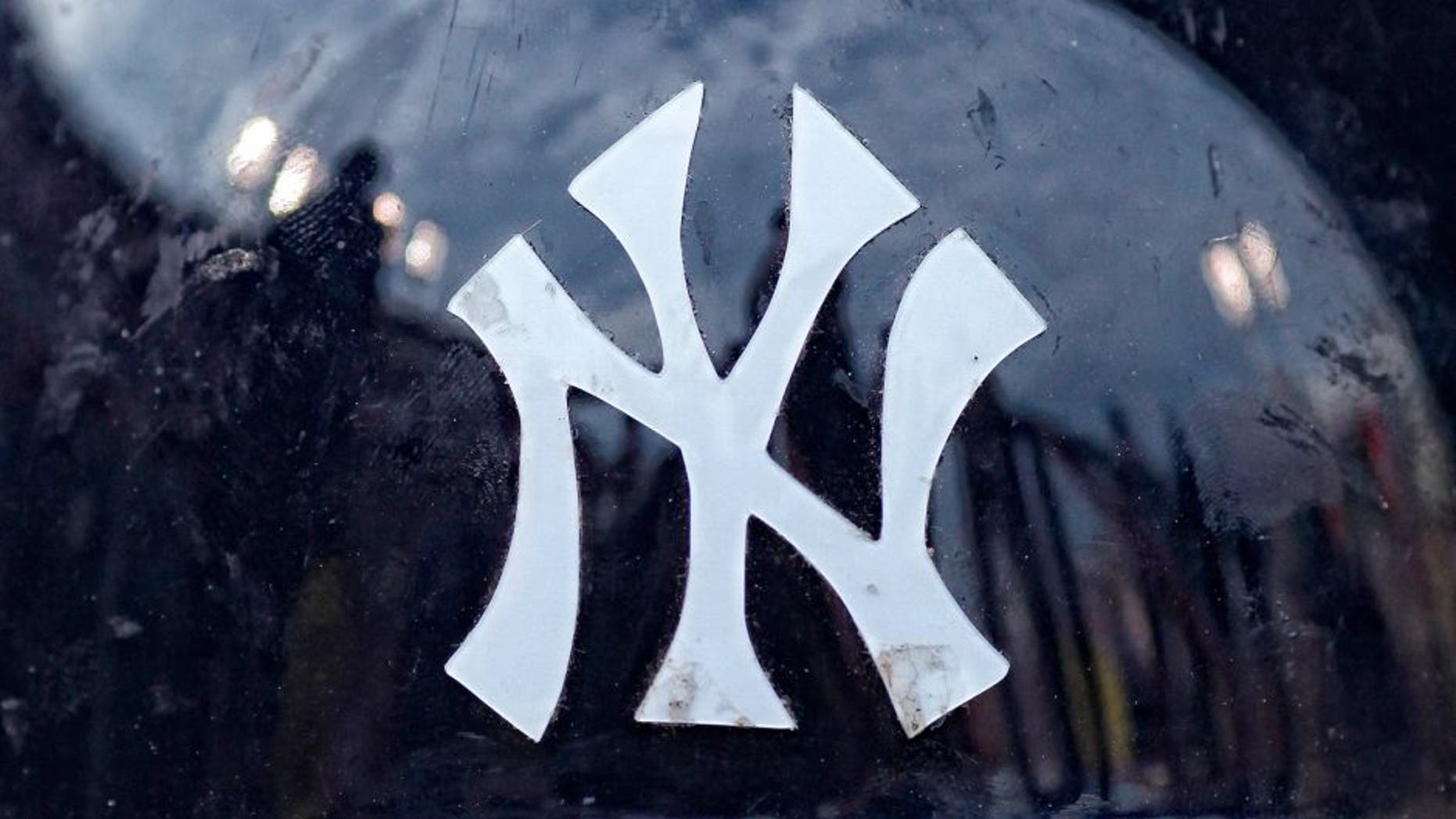 CINCINNATI, OH - JUNE 22: Detail view of the New York Yankees logo on the front of a batting helmet before the game against the Cincinnati Reds at Great American Ball Park on June 22, 2011 in Cincinnati, Ohio. The Reds won 10-2. (Photo by Joe Robbins/Getty Images)