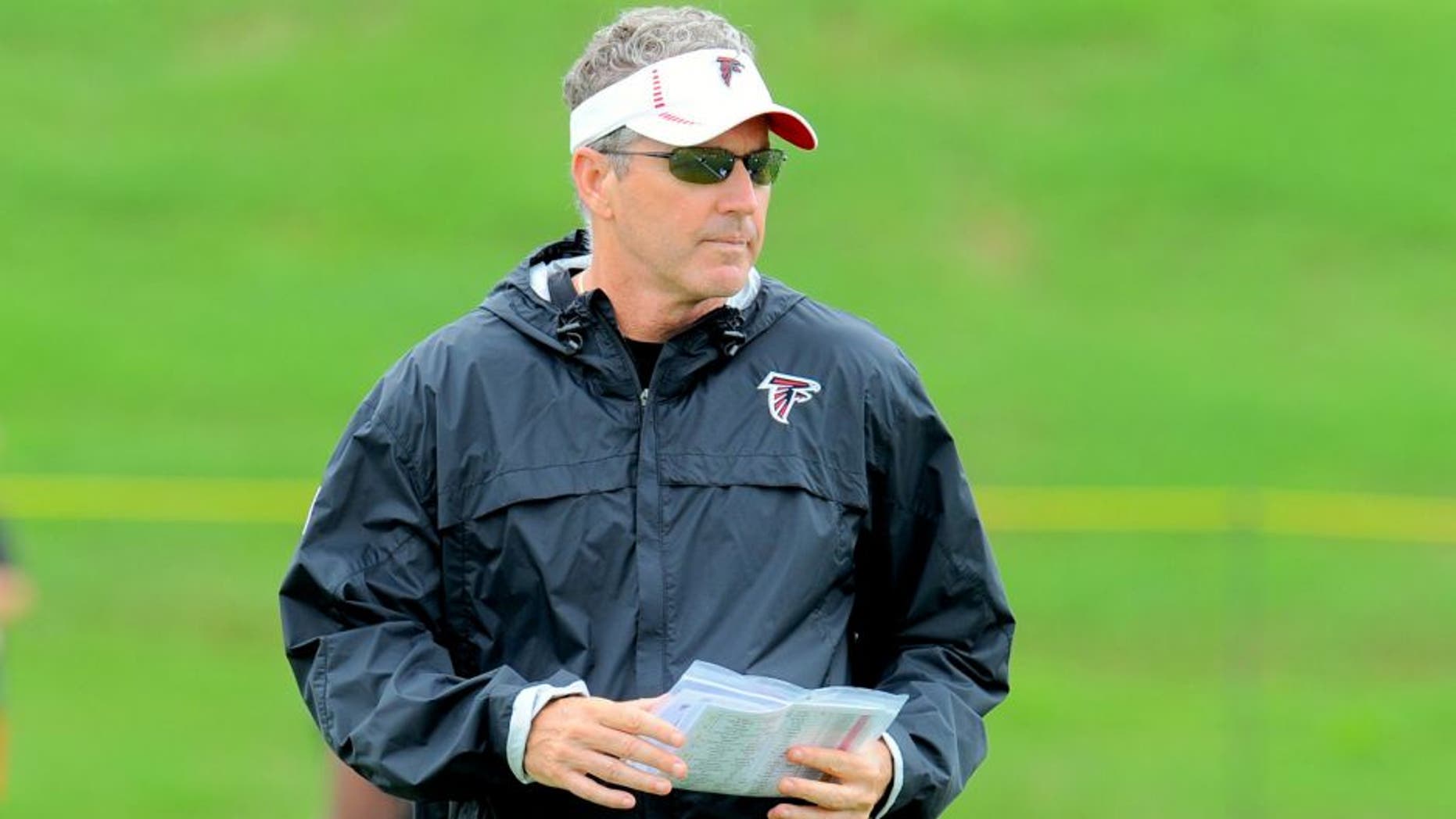 Jun 18, 2013; Flowery Branch, GA, USA; Atlanta Falcons offensive coordinator Dirk Koetter shown on the field during minicamp at the Falcons Training Complex. Mandatory Credit: Dale Zanine-USA TODAY Sports