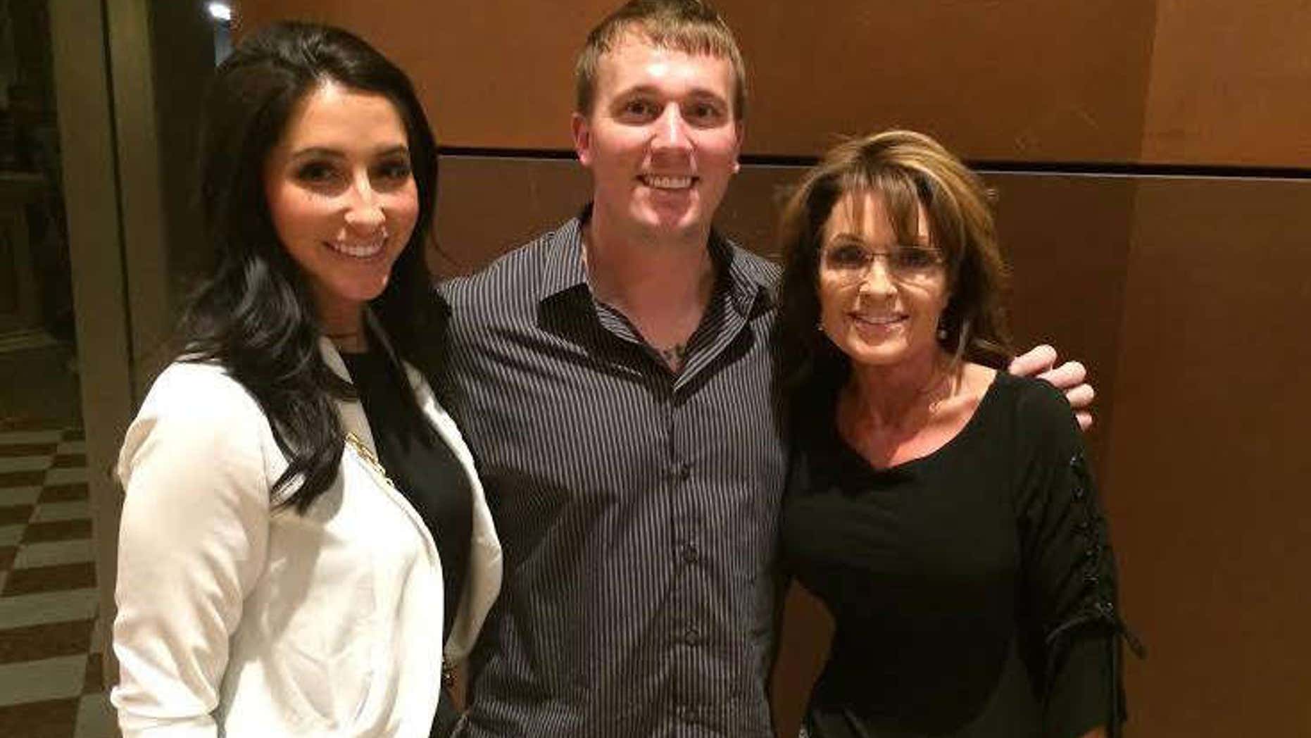 Jan. 26, 2015: Bristol Palin and Dakota Meyer pose with Sarah Palin.