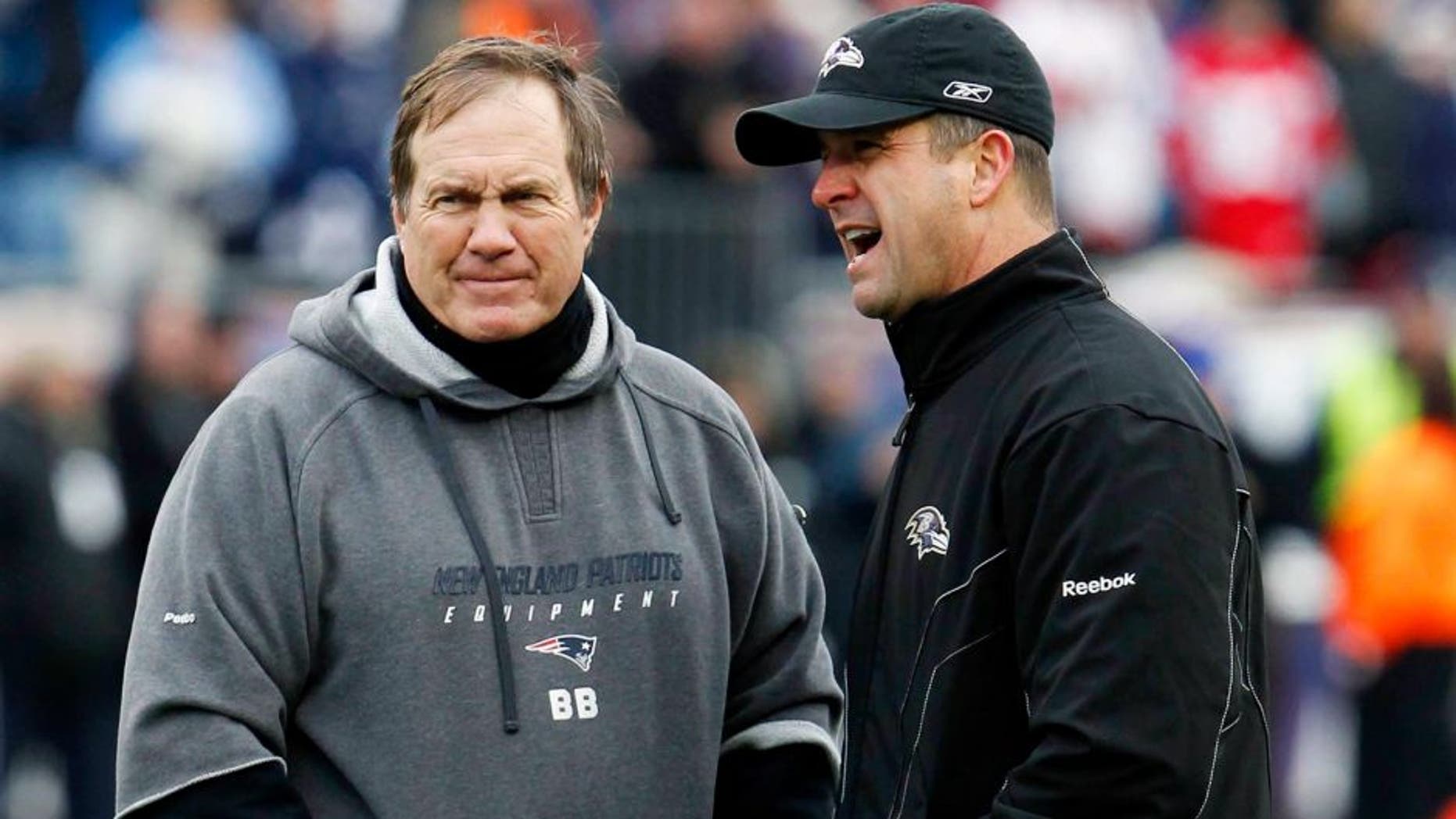 Jan 22, 2012; Foxborough, MA, USA; New England Patriots head coach Bill Belichick (left) and Baltimore Ravens head coach John Harbaugh (right) talk before the start of the 2011 AFC Championship game at Gillette Stadium. Mandatory Credit: David Butler II-USA TODAY Sports