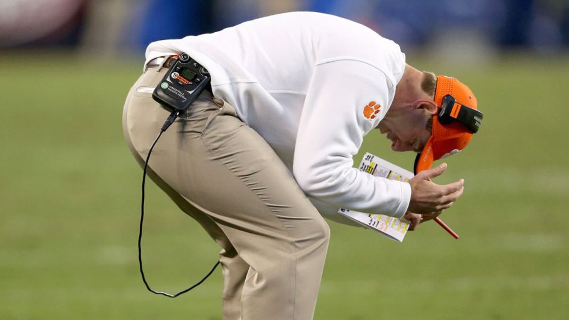 CHARLOTTE, NC - DECEMBER 05: Head coach Dabo Swinney of the Clemson Tigers reacts after a play against the North Carolina Tar Heels during the Atlantic Coast Conference Football Championship at Bank of America Stadium on December 5, 2015 in Charlotte, North Carolina. (Photo by Streeter Lecka/Getty Images)