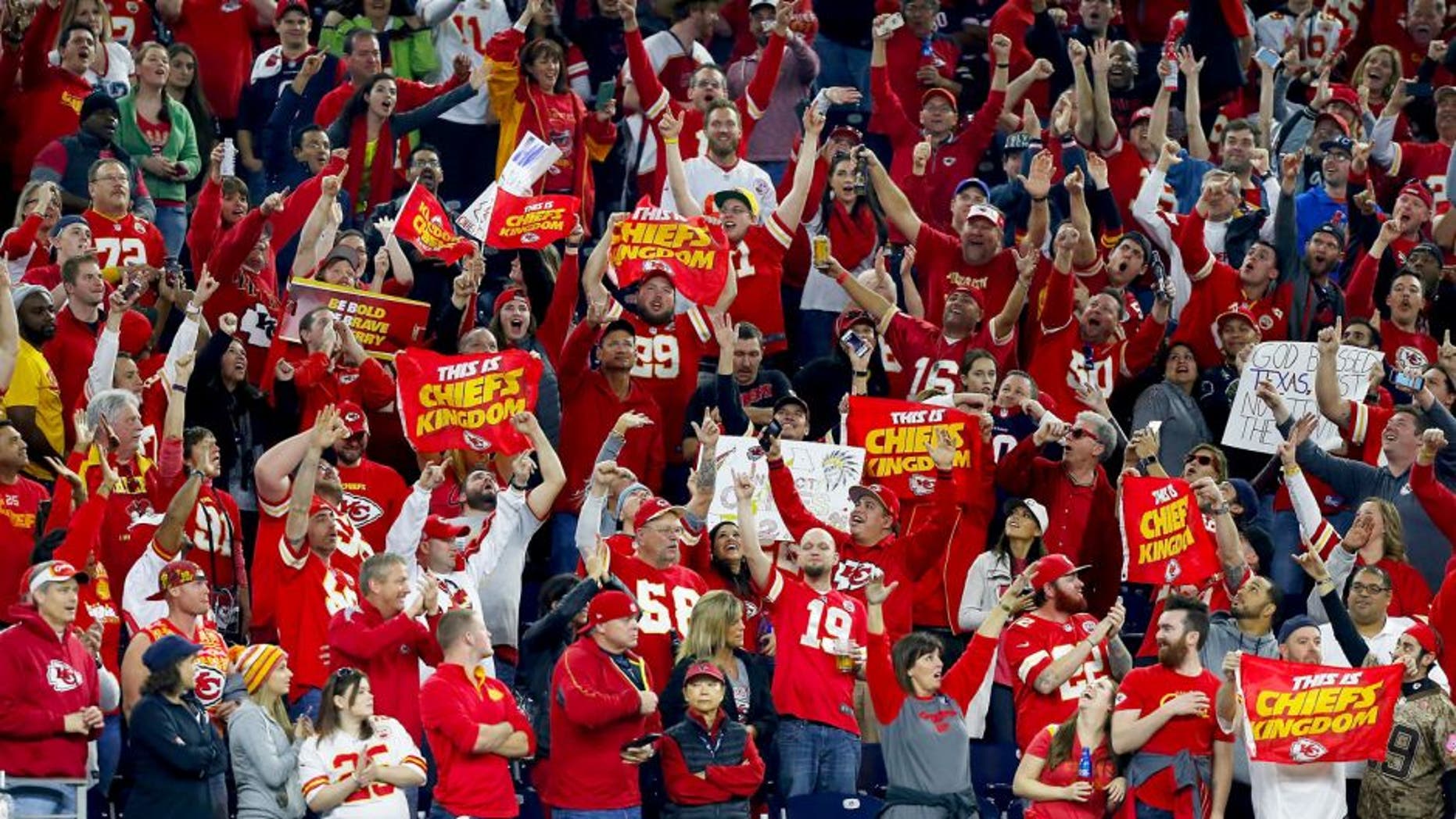 HOUSTON, TX - JANUARY 09: Fans of the Kansas City Chiefs celebrate their 30-0 win over the Houston Texans during the AFC Wild Card Playoff game at NRG Stadium on January 9, 2016 in Houston, Texas. (Photo by Bob Levey/Getty Images)