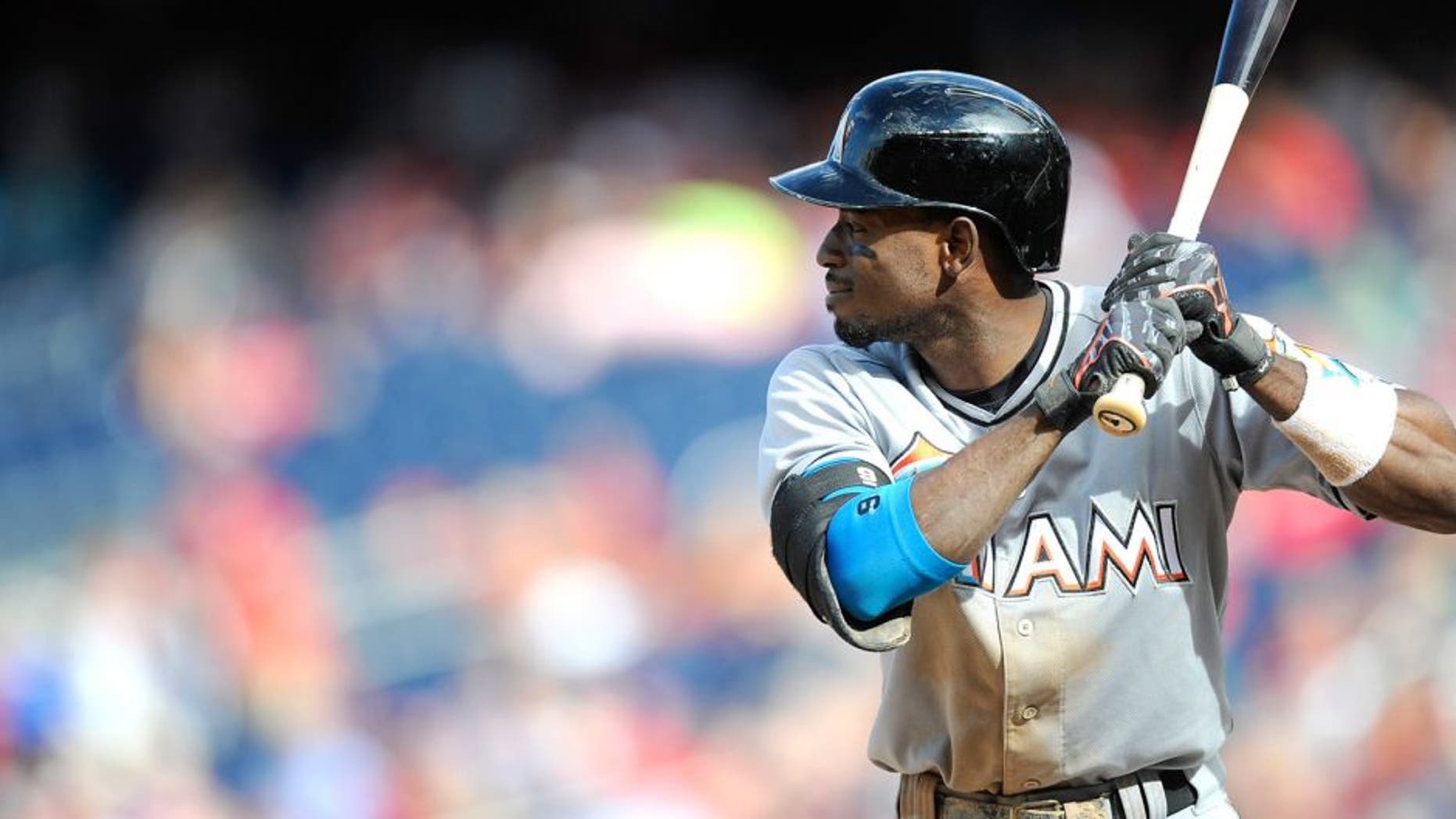 WASHINGTON, DC - SEPTEMBER 20: Dee Gordon #9 of the Miami Marlins bats against the Washington Nationals at Nationals Park on September 20, 2015 in Washington, DC. (Photo by G Fiume/Getty Images)