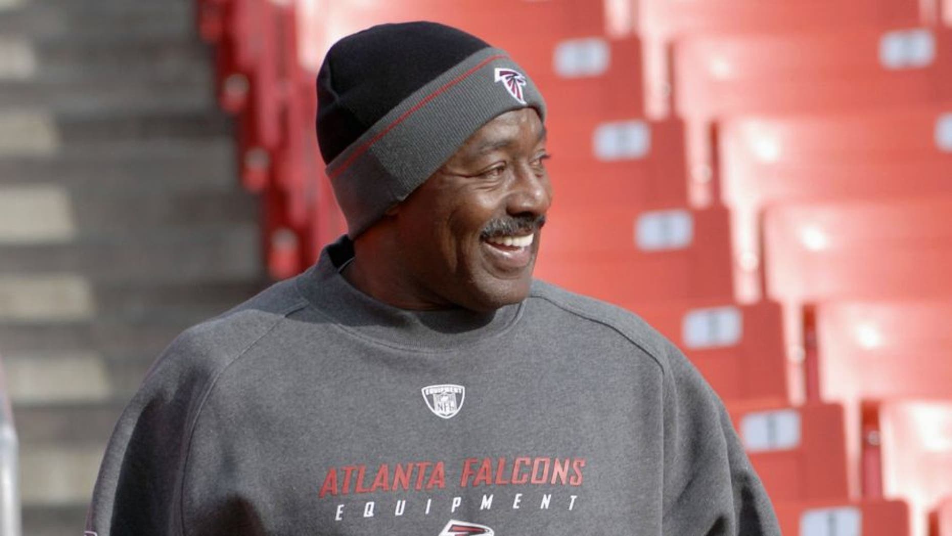 LANDOVER, MD - DECEMBER 3, 2006: Assistant coach for strength and conditioning Billy "White Shoes" Johnson, of the Atlanta Falcons, jogs in the stands prior to a game on December 3, 2006 against the Washington Redskins at Fedex Field in Landover, Maryland. (Photo by: Diamond Images/Getty Images)