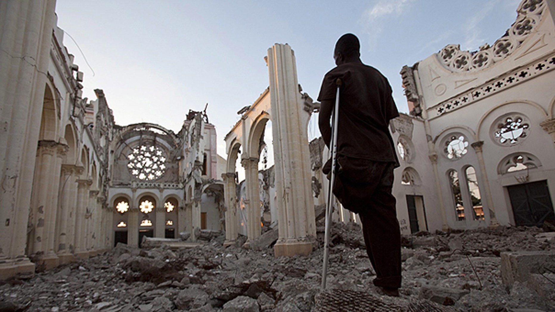 Jan. 11: Icaris Celnet stands in the ruins of The Cathedral of Our Lady of the Assumption, often called Cathédrale de Port-au-Prince in Port-au-Prince, Haiti, on the eve of the first anniversary of the earthquake that killed more than 200,000 people and displaced some 1.5 million more.