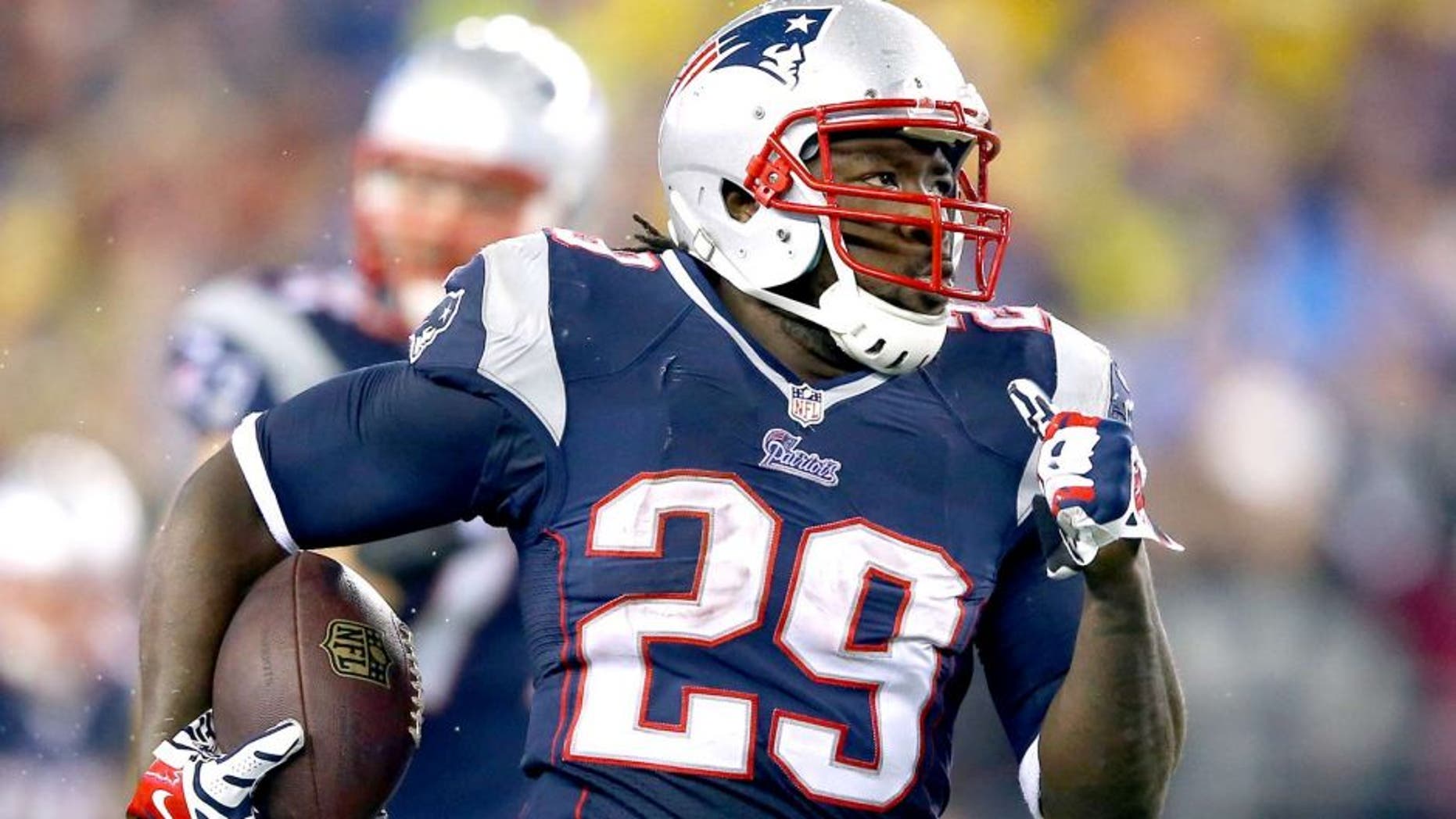 FOXBORO, MA - JANUARY 11: LeGarrette Blount #29 of the New England Patriots runs a 73 yard touchdown in the fourth quarter against the Indianapolis Colts during the AFC Divisional Playoff game at Gillette Stadium on January 11, 2014 in Foxboro, Massachusetts. (Photo by Al Bello/Getty Images)
