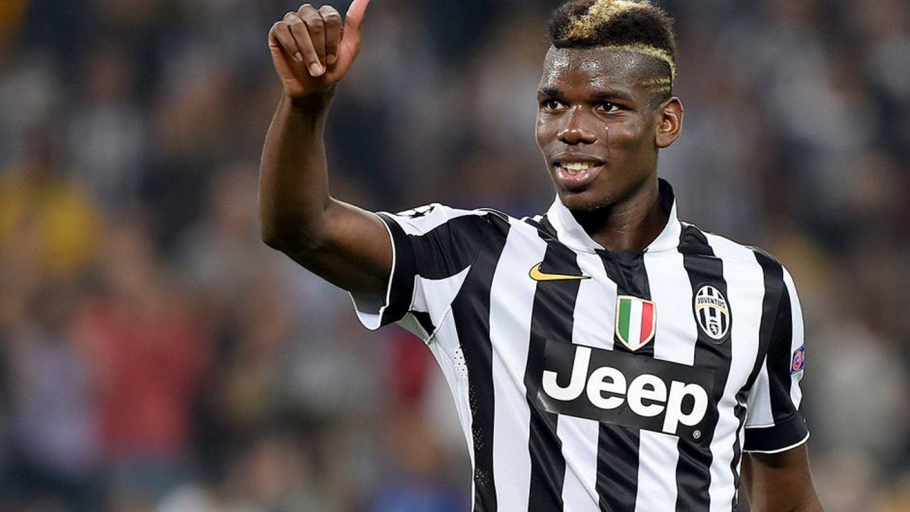 TURIN, ITALY - SEPTEMBER 16: Paul Pogba of Juventus salutes the fans at the end of the UEFA Champions League Group A match between Juventus and Malmo FF on September 16, 2014 in Turin, Italy. (Photo by Valerio Pennicino/Getty Images)