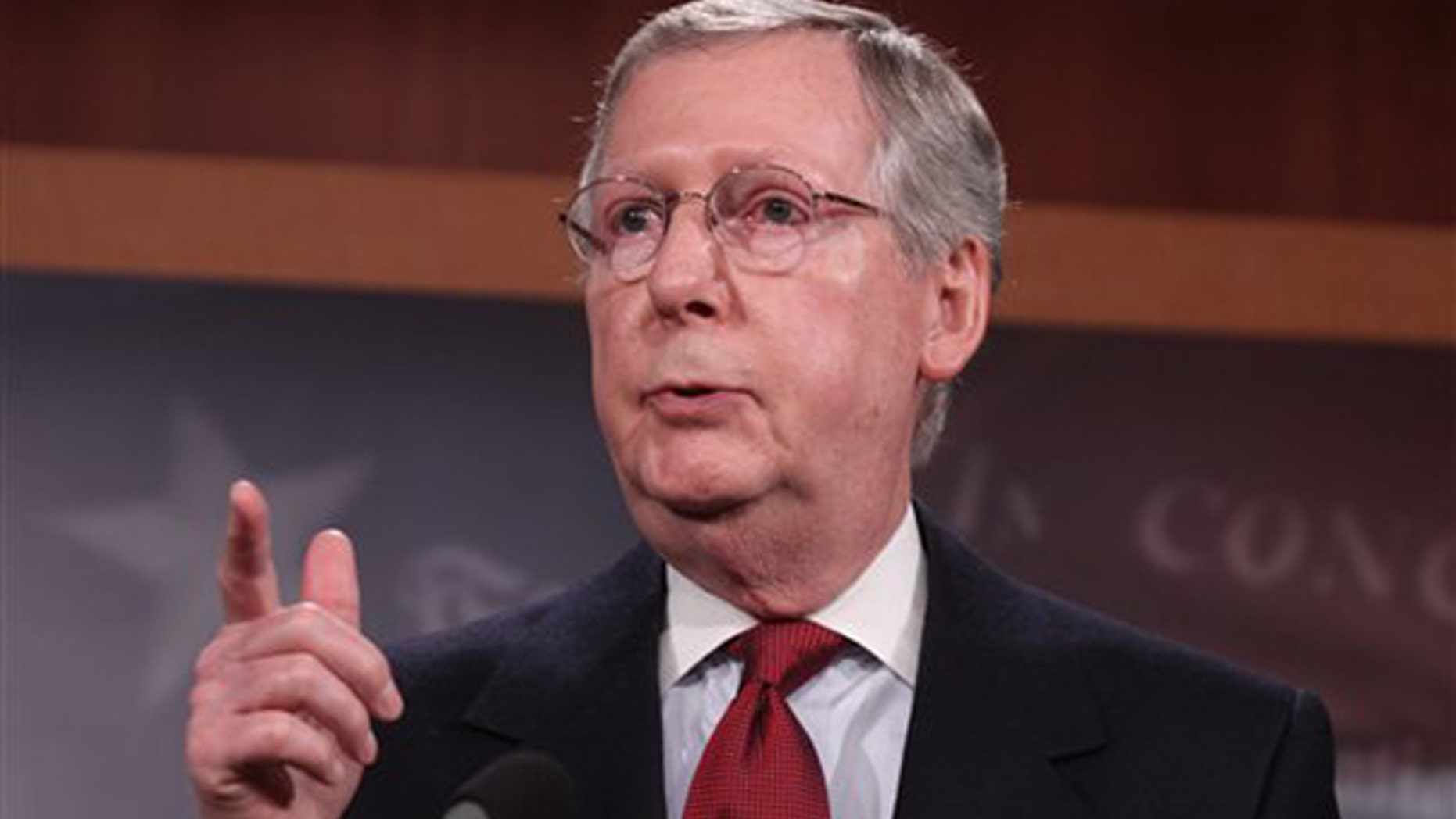 FILE: Jan. 12, 2010: Senate Minority Leader Mitch McConnell gestures while meeting with reporters on Capitol Hill, in Washington, D.C.