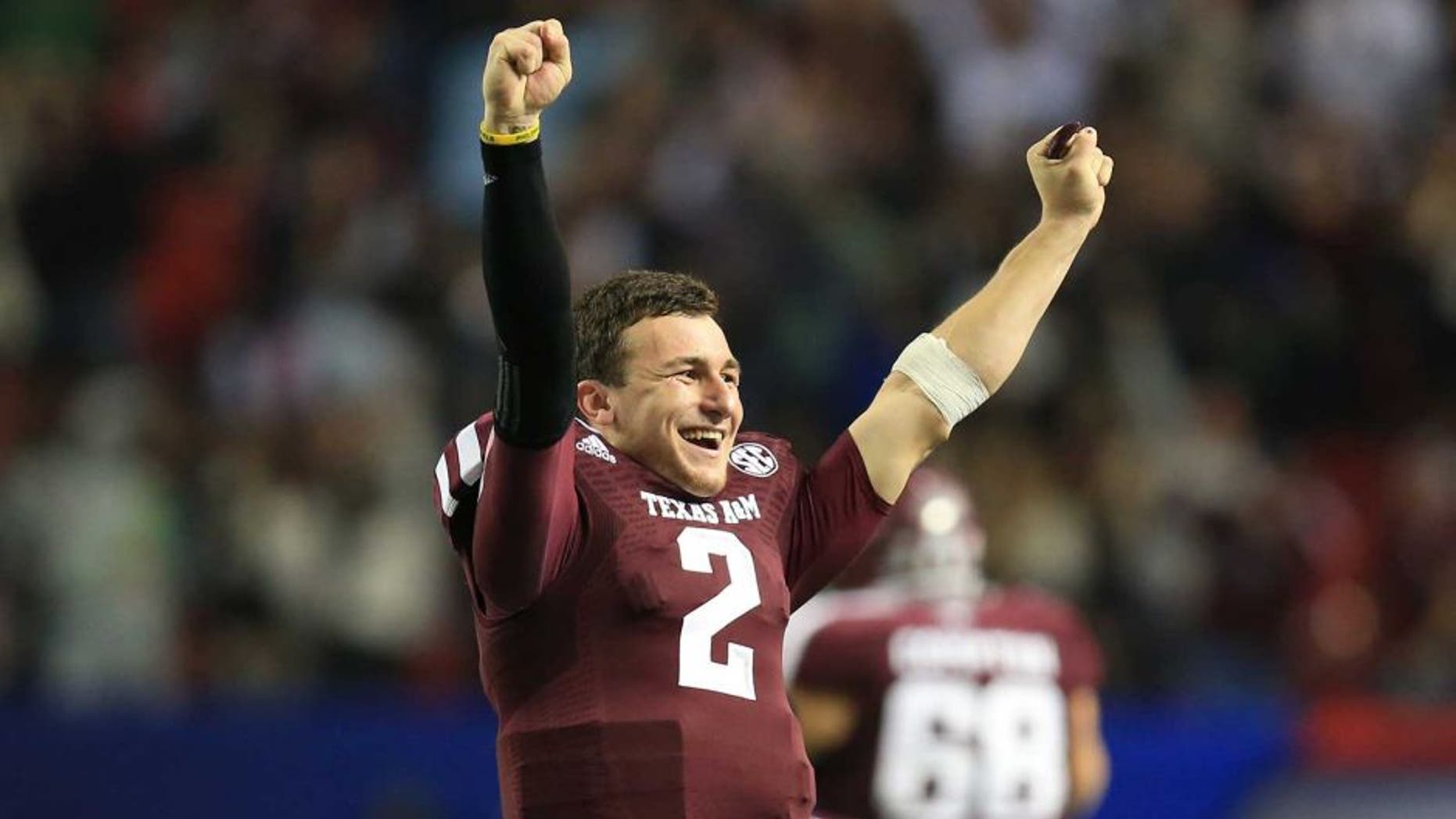 Dec 31, 2013; Atlanta, GA, USA; Texas A&M Aggies quarterback Johnny Manziel (2) reacts to a fourth-quarter interception against the Duke Blue Devils in the 2013 Chick-fil-A Bowl at the Georgia Dome. Mandatory Credit: Daniel Shirey-USA TODAY Sports