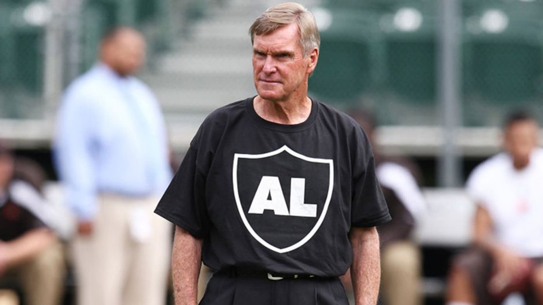 16 October 2011: Oakland Raiders offensive coordinator Al Saunders wears a shirt to honor Oakland Raiders owner Al Davis as the Oakland Raiders beat the Cleveland Browns 24-17 at O.Co Coliseum in Oakland, Ca ***FOR EDITORIAL USE ONLY****