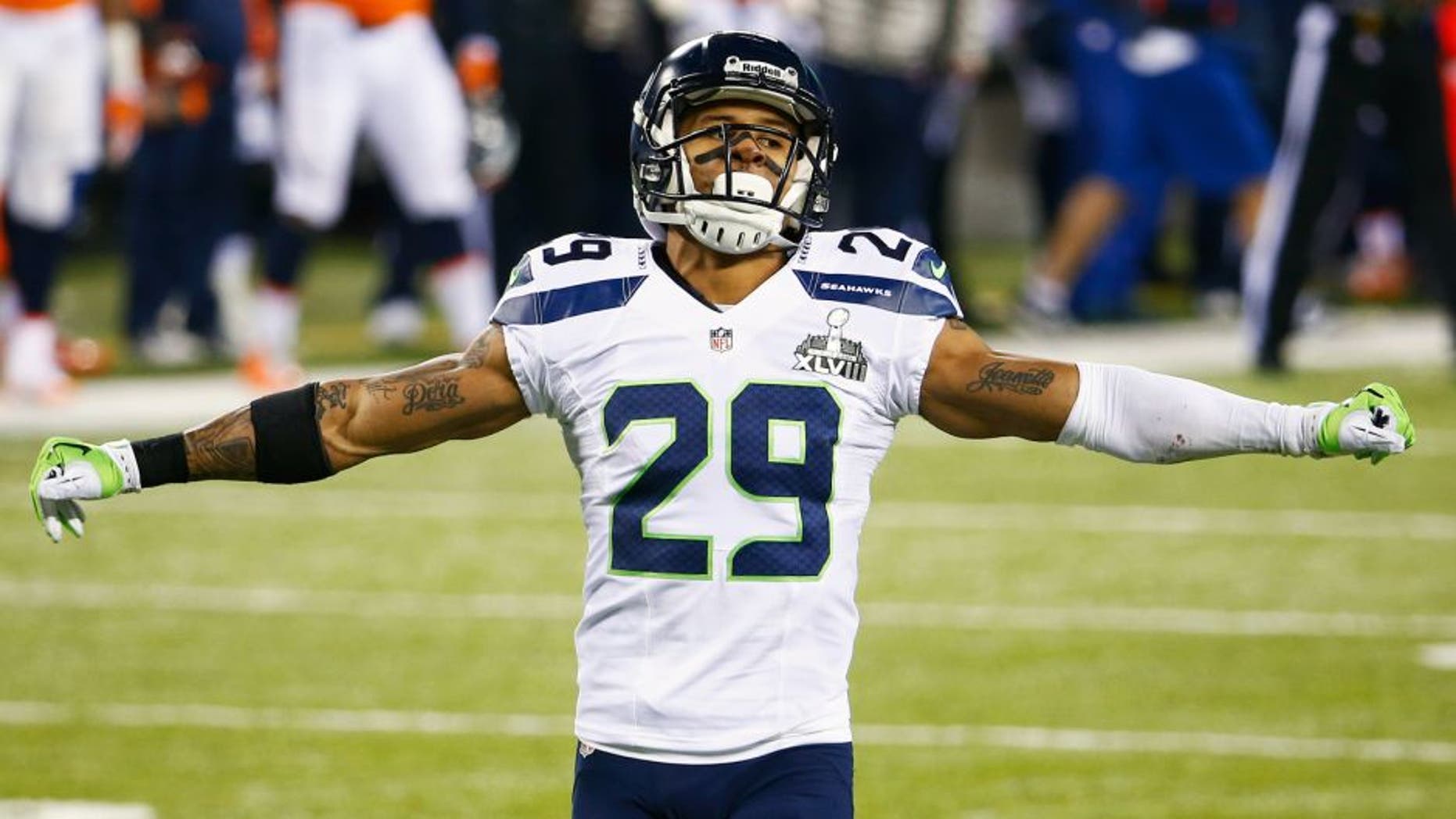 EAST RUTHERFORD, NJ - FEBRUARY 02: Free safety Earl Thomas #29 of the Seattle Seahawks gestures during the second quarter Super Bowl XLVIII at MetLife Stadium on February 2, 2014 in East Rutherford, New Jersey. (Photo by Tom Pennington/Getty Images)
