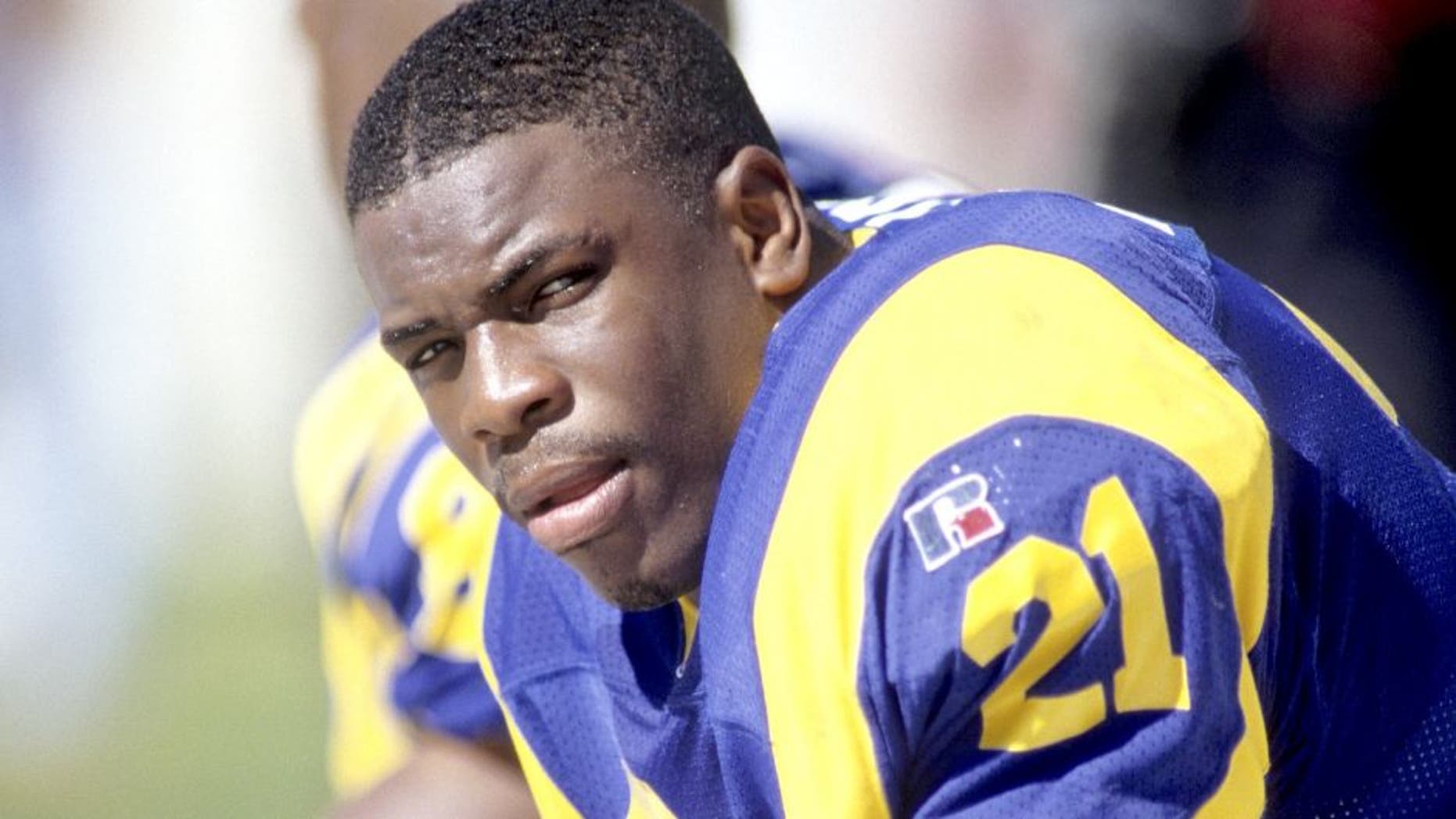 CHARLOTTE, NC - OCTOBER 13: Lawrence Phillips #21 of the St. Louis Rams looks on against the Carolina Panthers at Ericsson Stadium on October 13, 1996 in Charlotte, North Carolina. The Panthers defeated the Rams 45-13. (Photo by Joe Robbins/Getty Images)