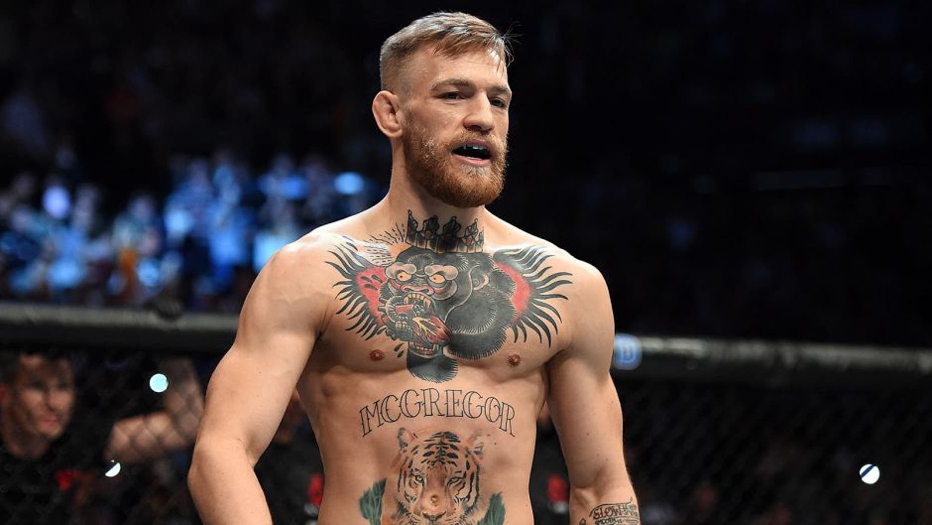 LAS VEGAS, NEVADA - DECEMBER 12: Conor McGregor of Ireland stands in his corner before facing Jose Aldo of Brazil in their featherweight championship bout during the UFC 194 event inside MGM Grand Garden Arena on December 12, 2015 in Las Vegas, Nevada. (Photo by Jeff Bottari/Zuffa LLC/Zuffa LLC via Getty Images)