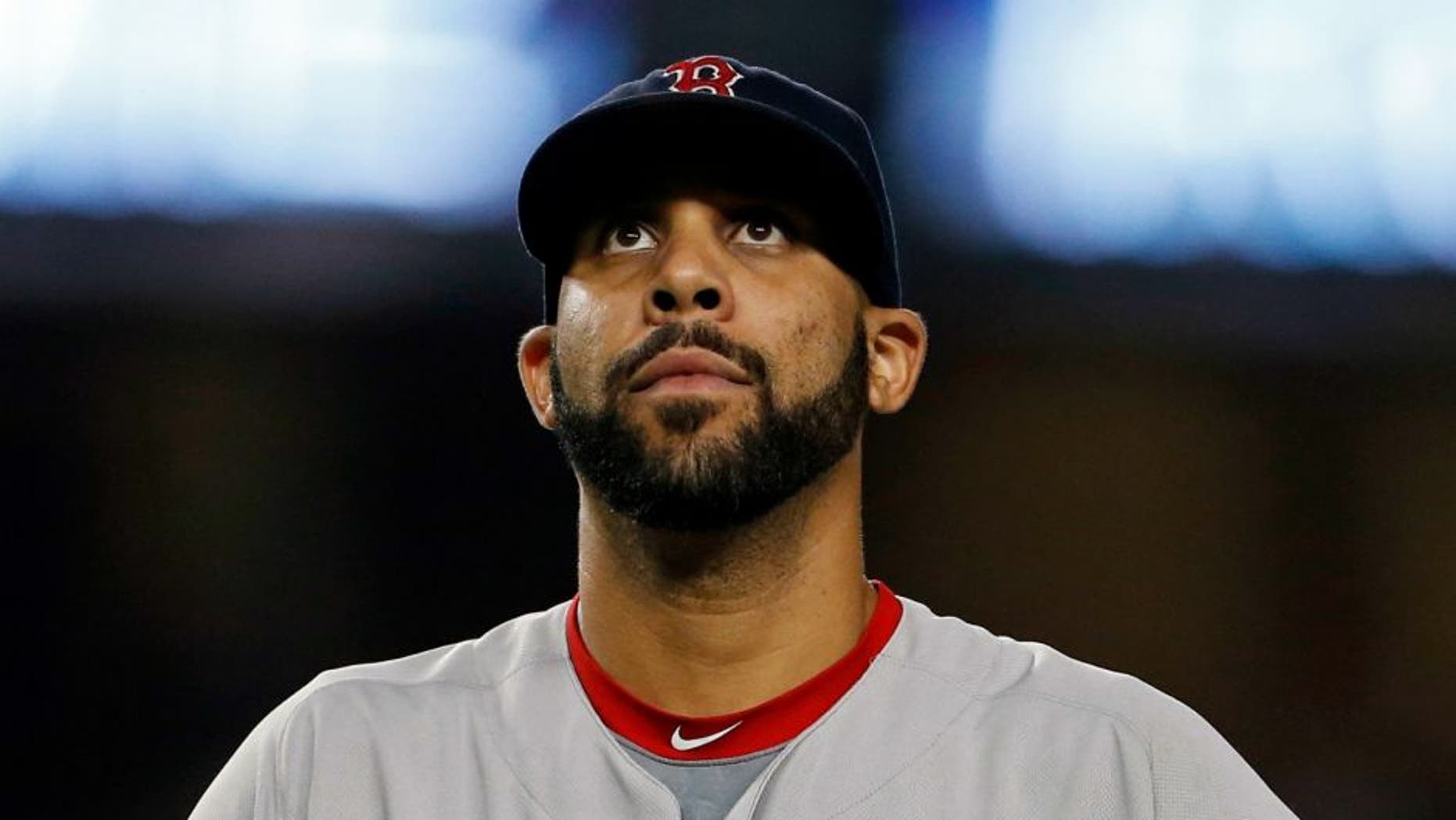 Sep 27, 2016; Bronx, NY, USA; Boston Red Sox starting pitcher David Price (24) reacts after giving up a two-run home run to New York Yankees first baseman Tyler Austin (26) during the seventh inning at Yankee Stadium. Mandatory Credit: Adam Hunger-USA TODAY Sports