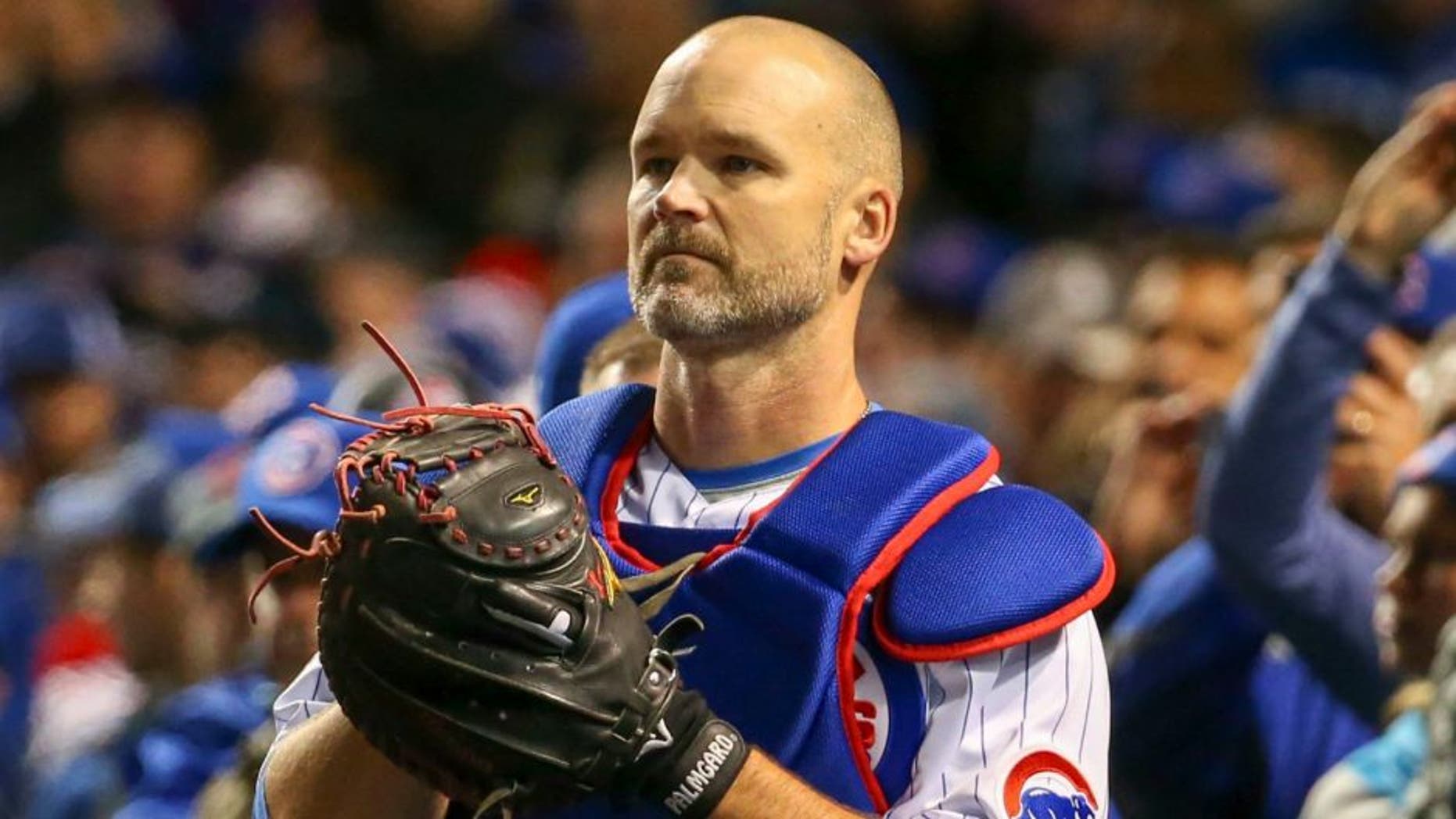 Oct 30, 2016; Chicago, IL, USA; Chicago Cubs catcher David Ross (3) stands in the dugout before game five of the 2016 World Series against the Cleveland Indians at Wrigley Field. Mandatory Credit: Jerry Lai-USA TODAY Sports